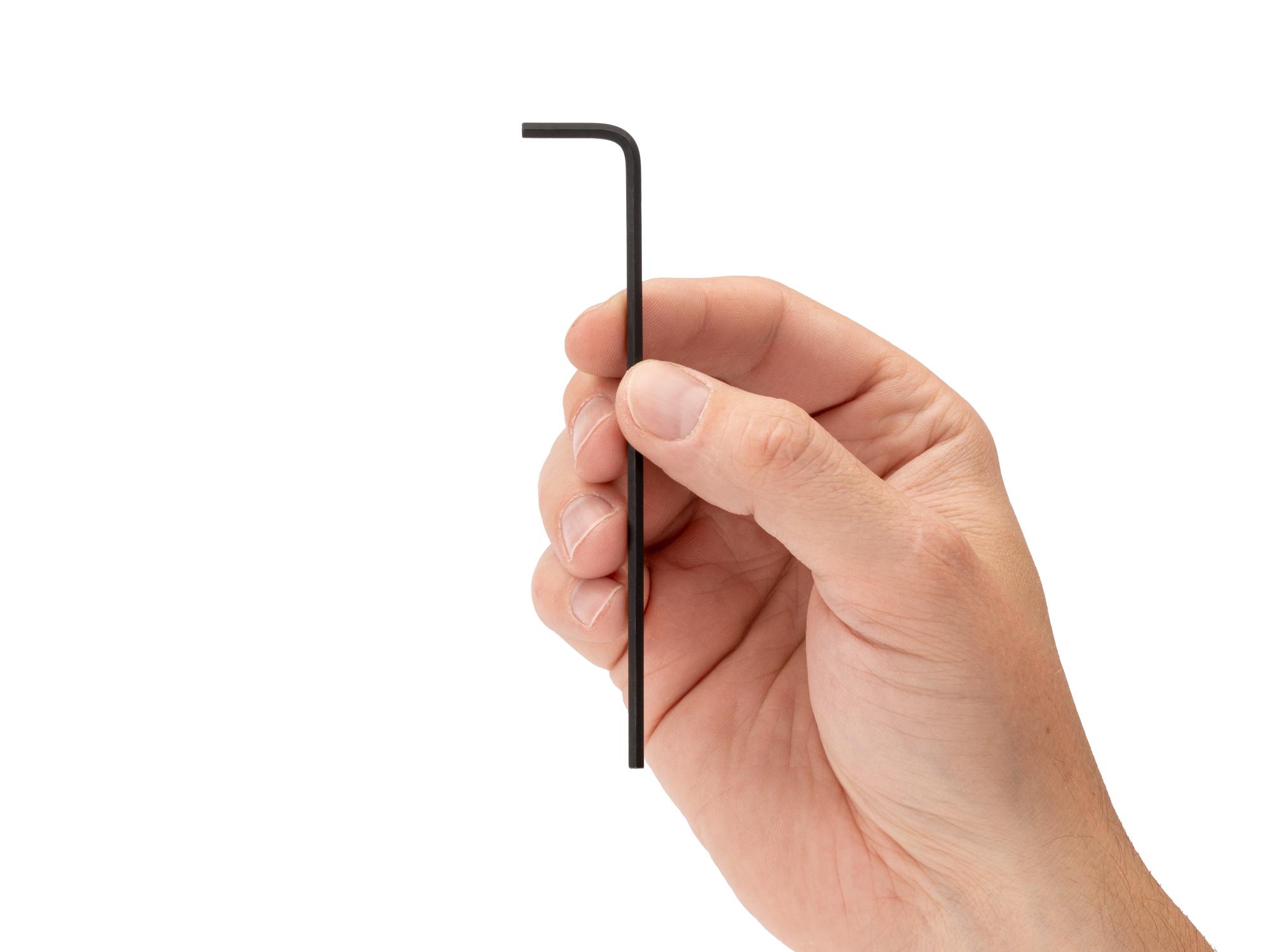 Person holding Tekton l-key. Item #KLX22030