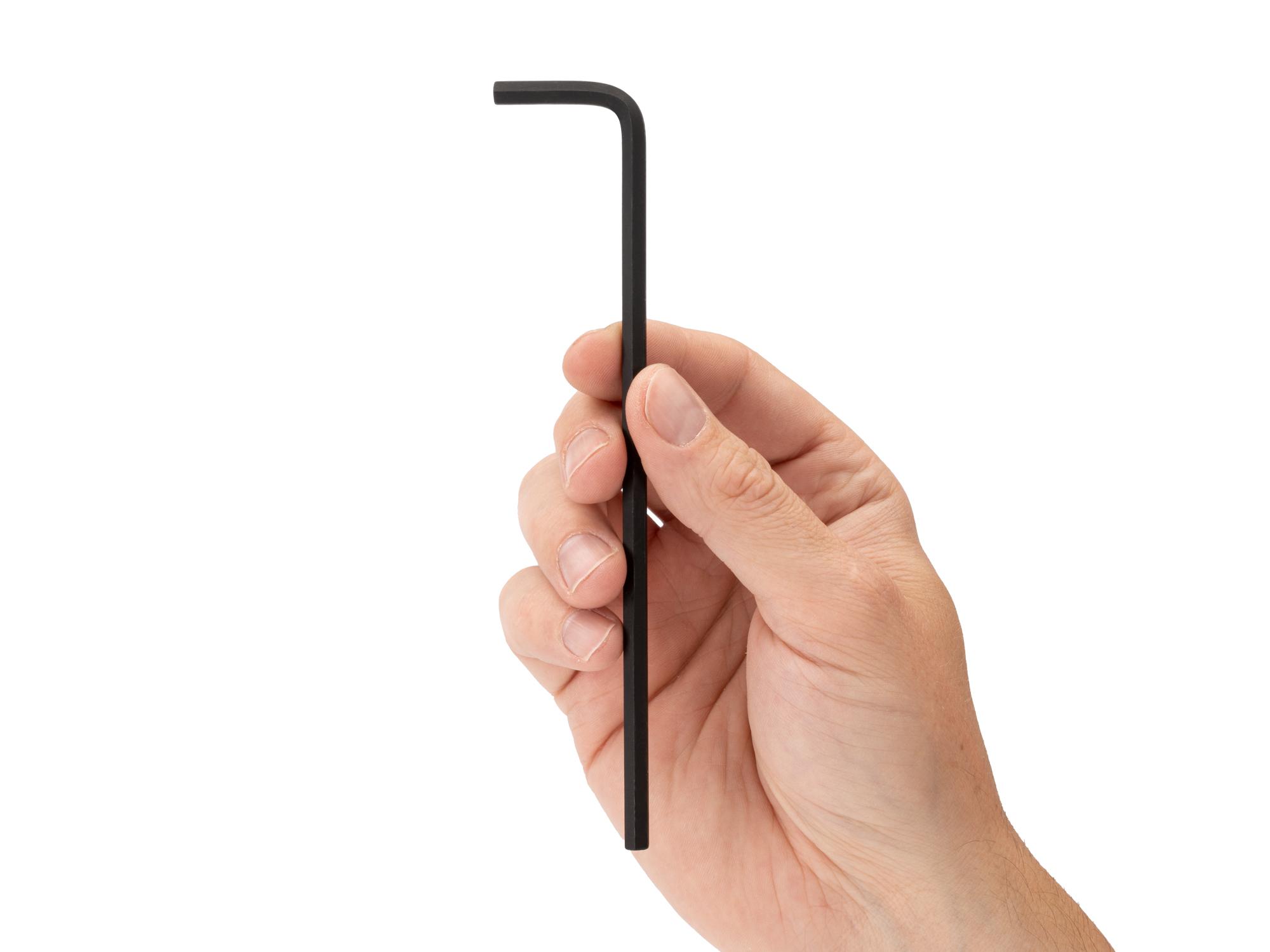 Person holding Tekton l-key. Item #KLX22050
