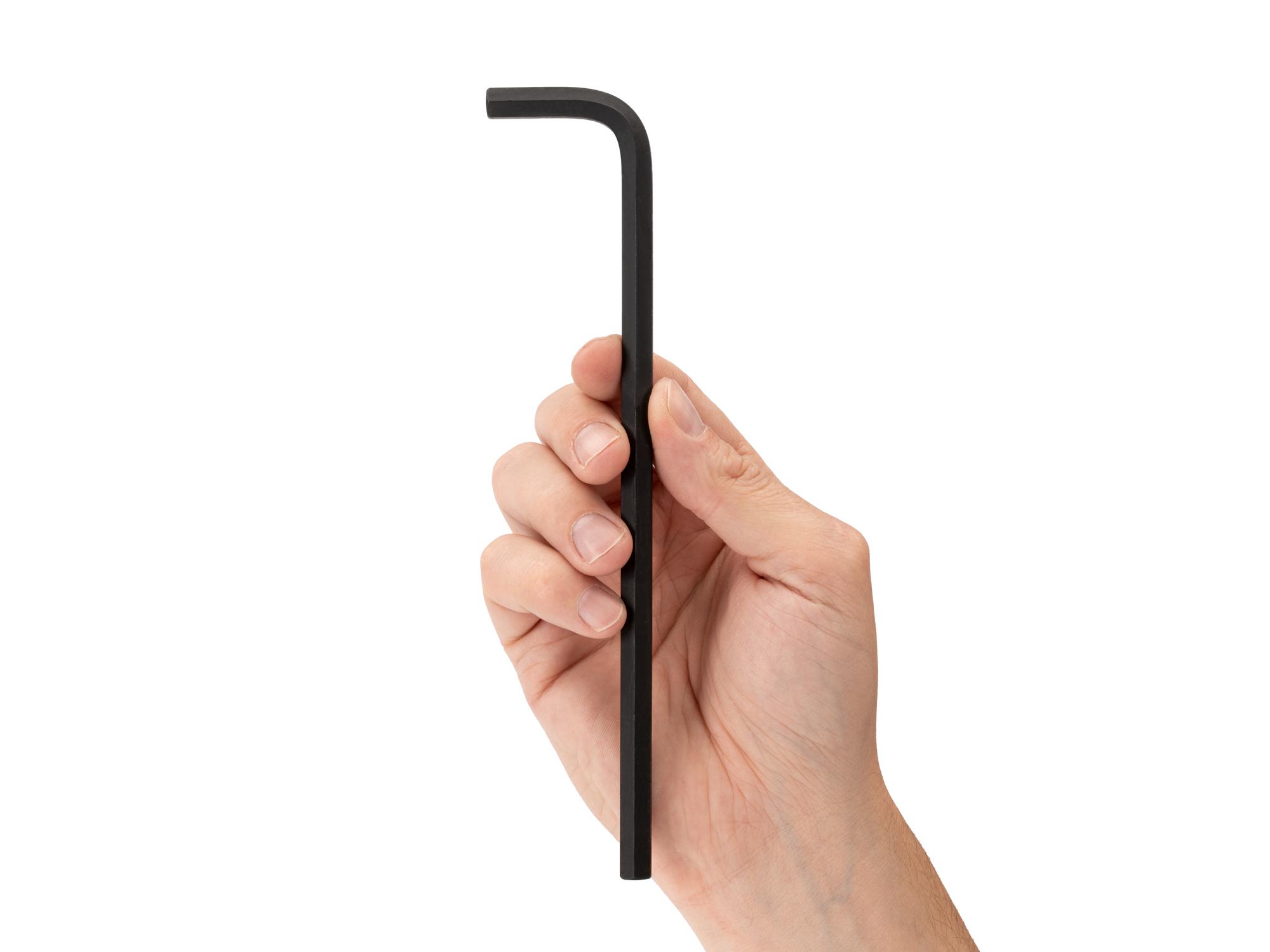 Person holding Tekton l-key. Item #KLX22080