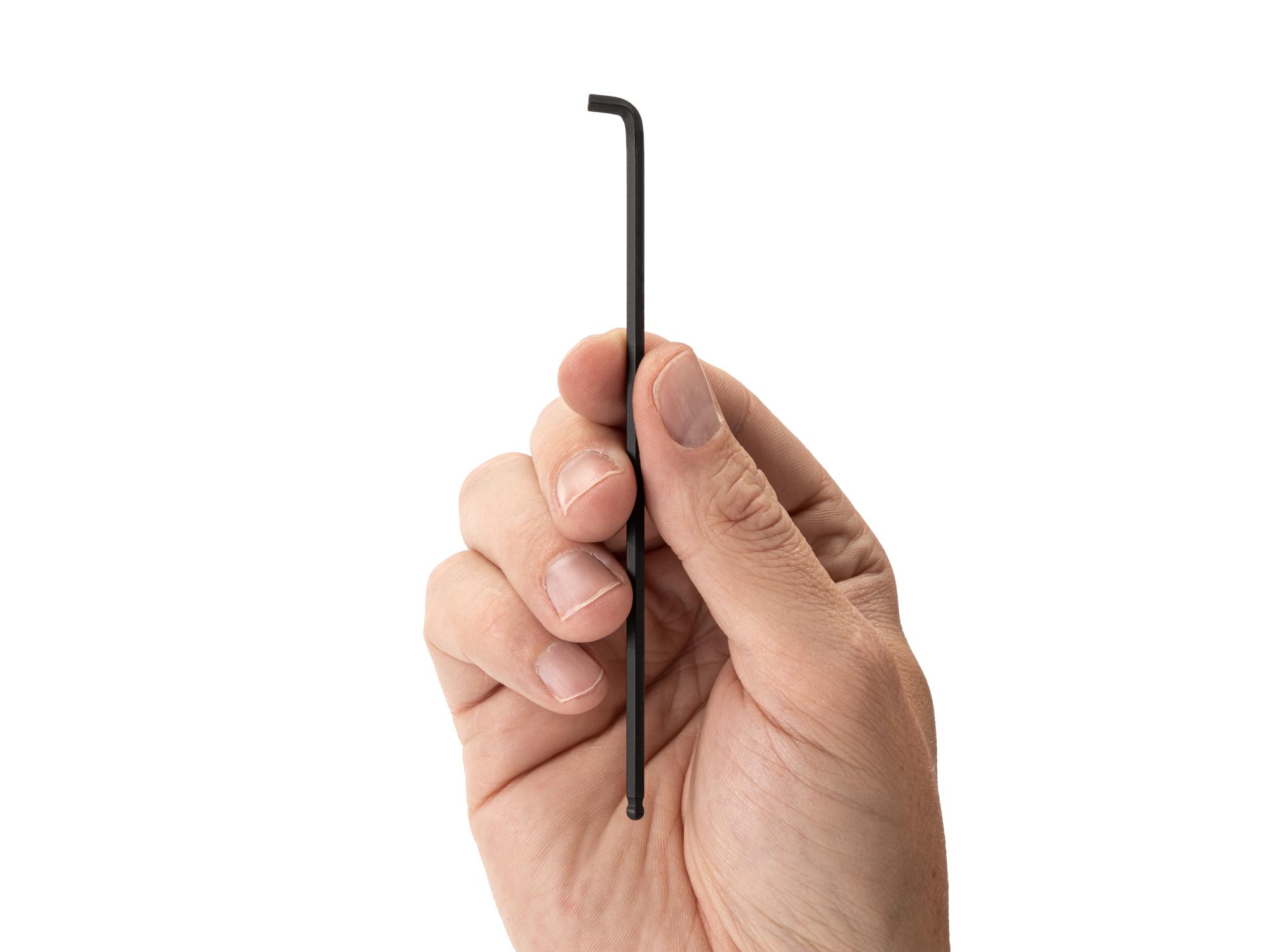 Person holding Tekton l-key. Item #KLX77125