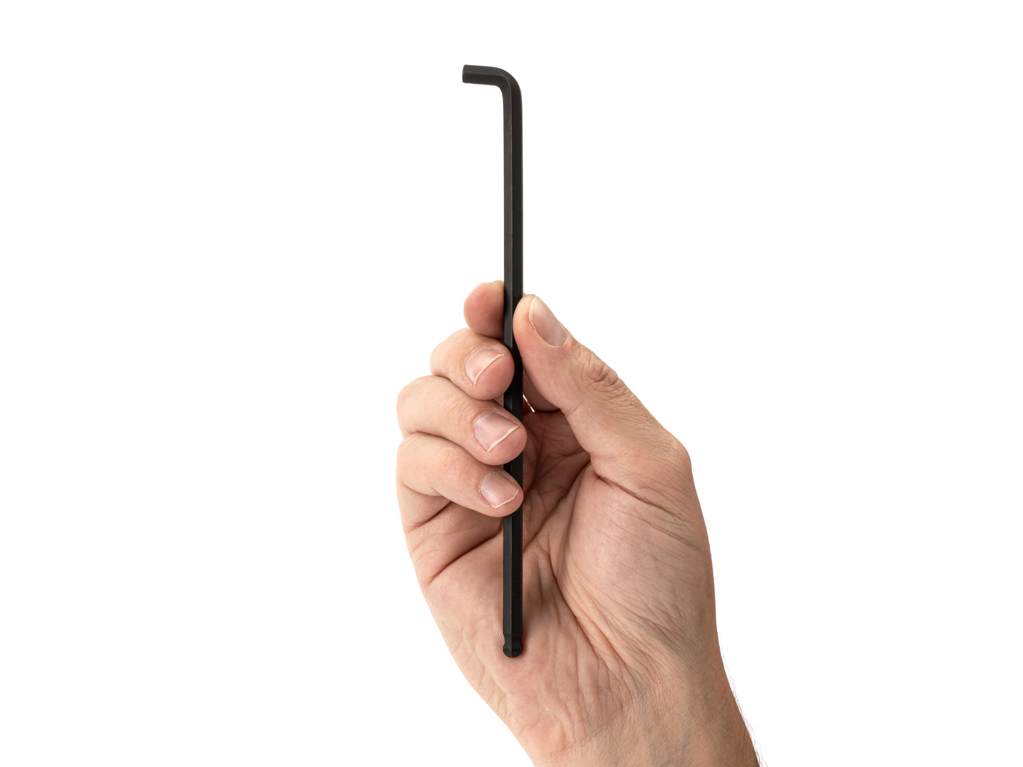 Person holding Tekton l-key. Item #KLX77219