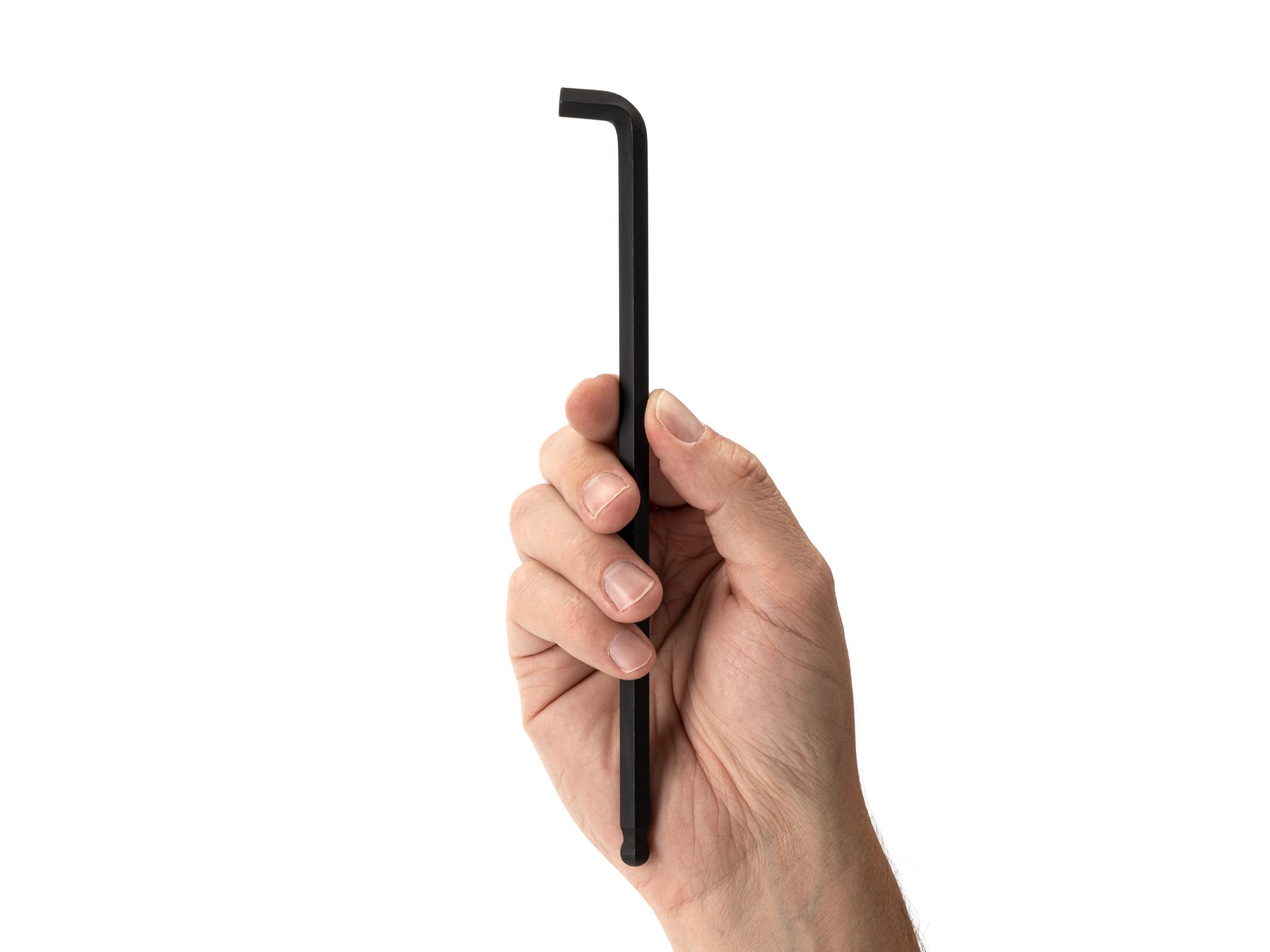 Person holding Tekton l-key. Item #KLX77313