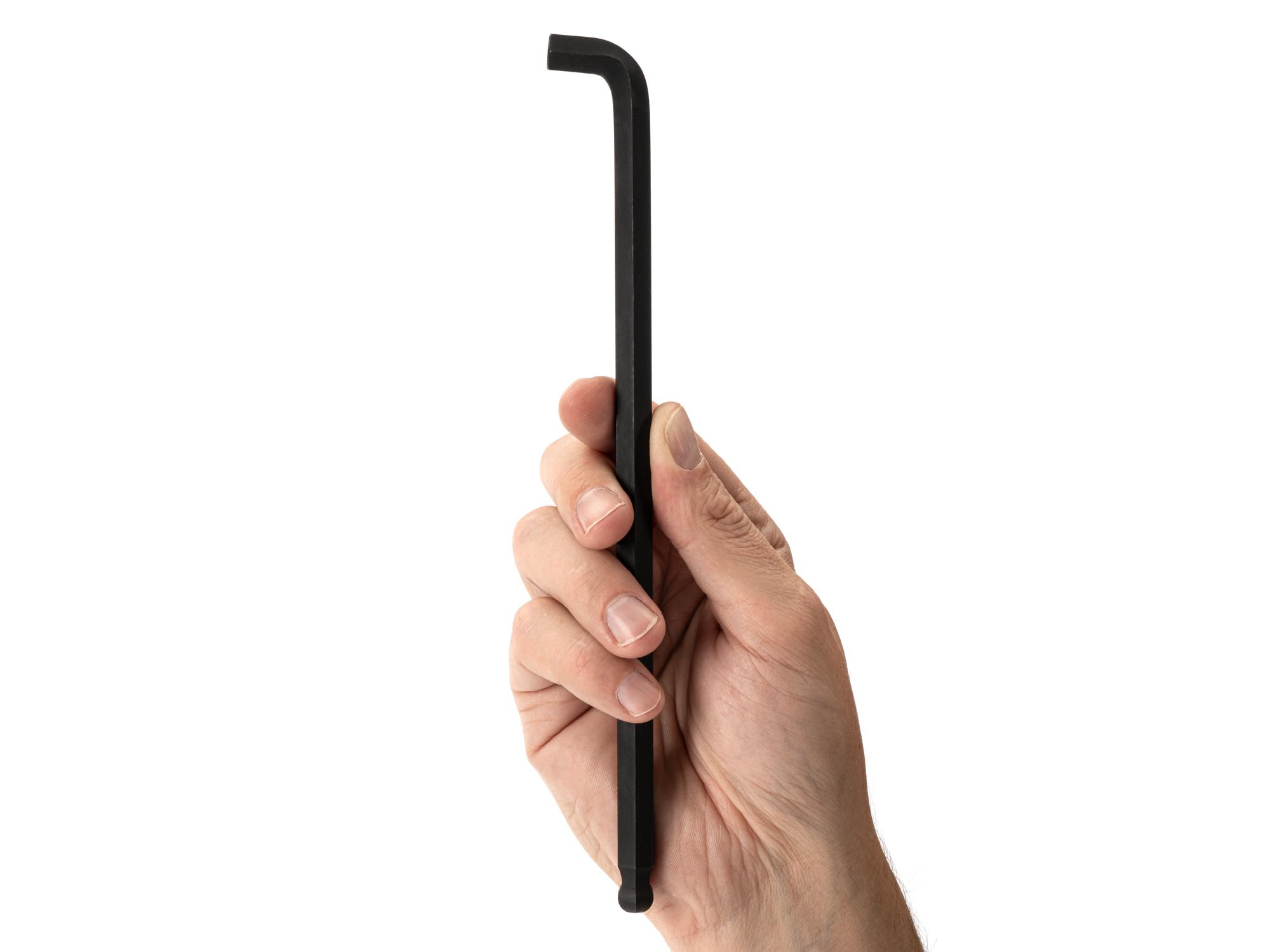 Person holding Tekton l-key. Item #KLX77375