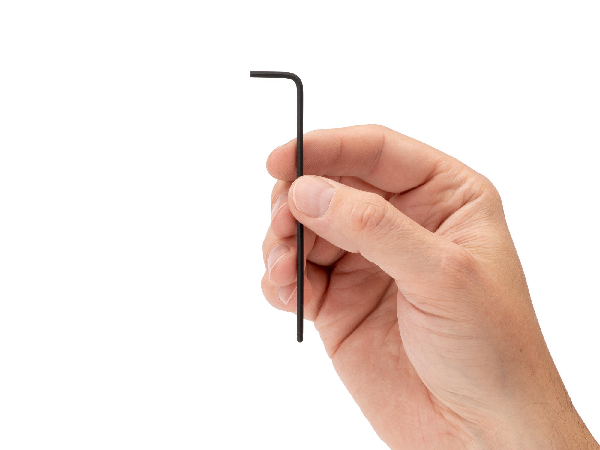Person holding Tekton l-key. Item #KLX82025