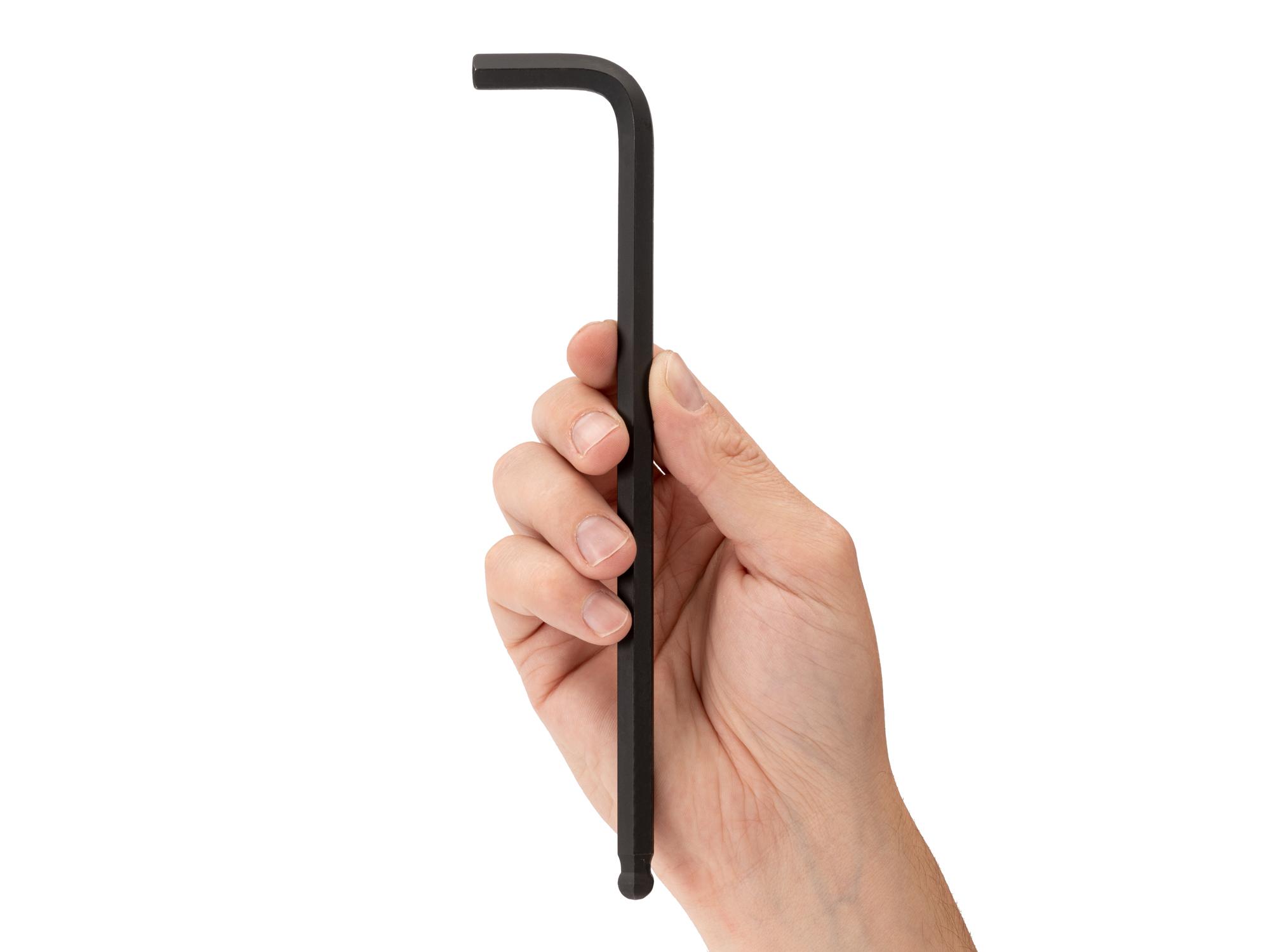 Person holding Tekton l-key. Item #KLX82090
