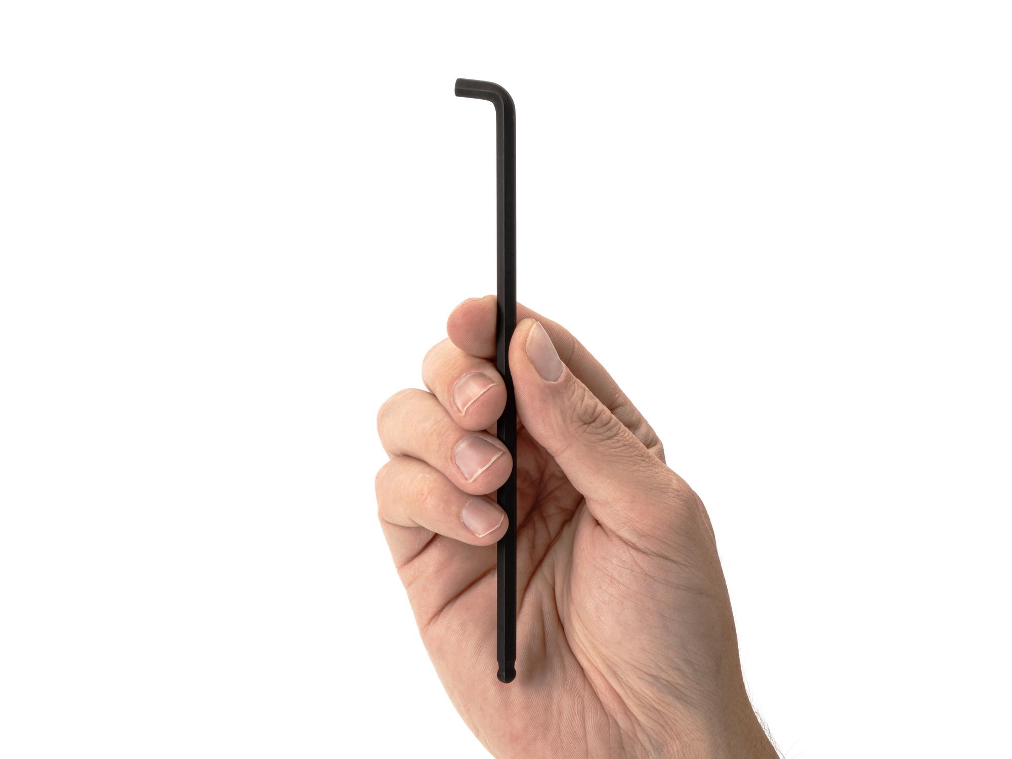 Person holding Tekton l-key. Item #KLX87050