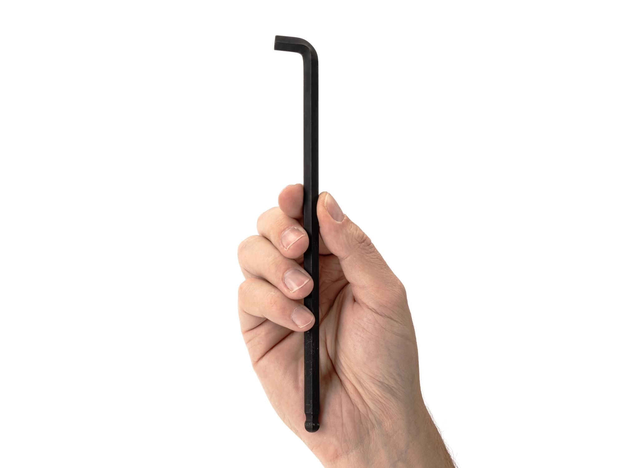 Person holding Tekton l-key. Item #KLX87080