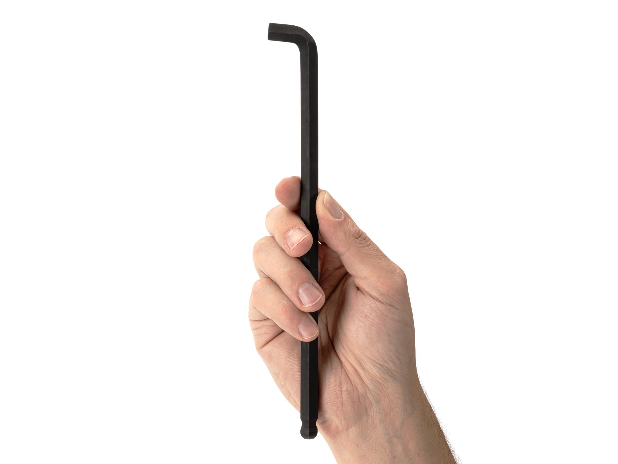 Person holding Tekton l-key. Item #KLX87100