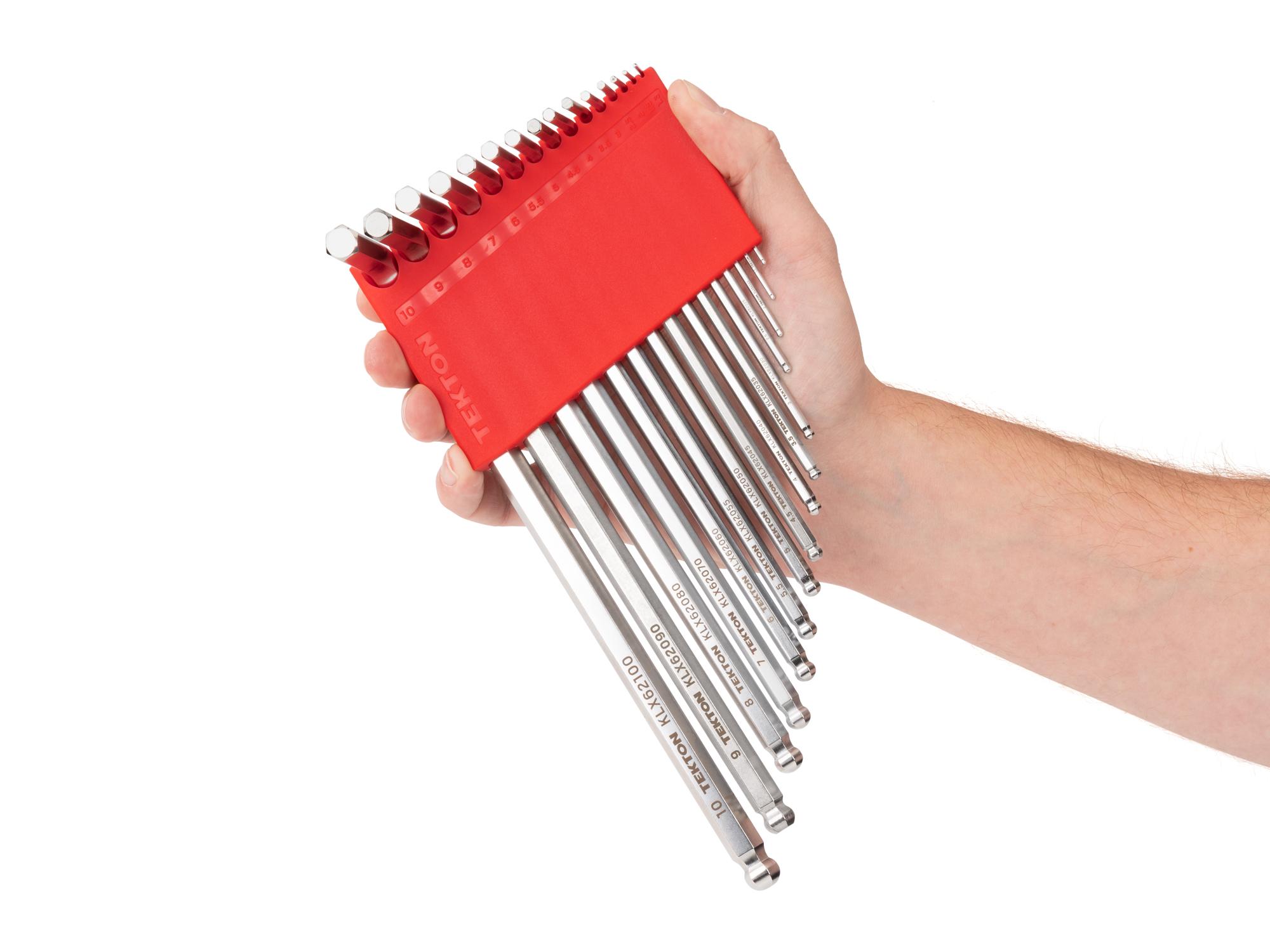 Person holding Tekton holder l-key set. Item #KEY91001