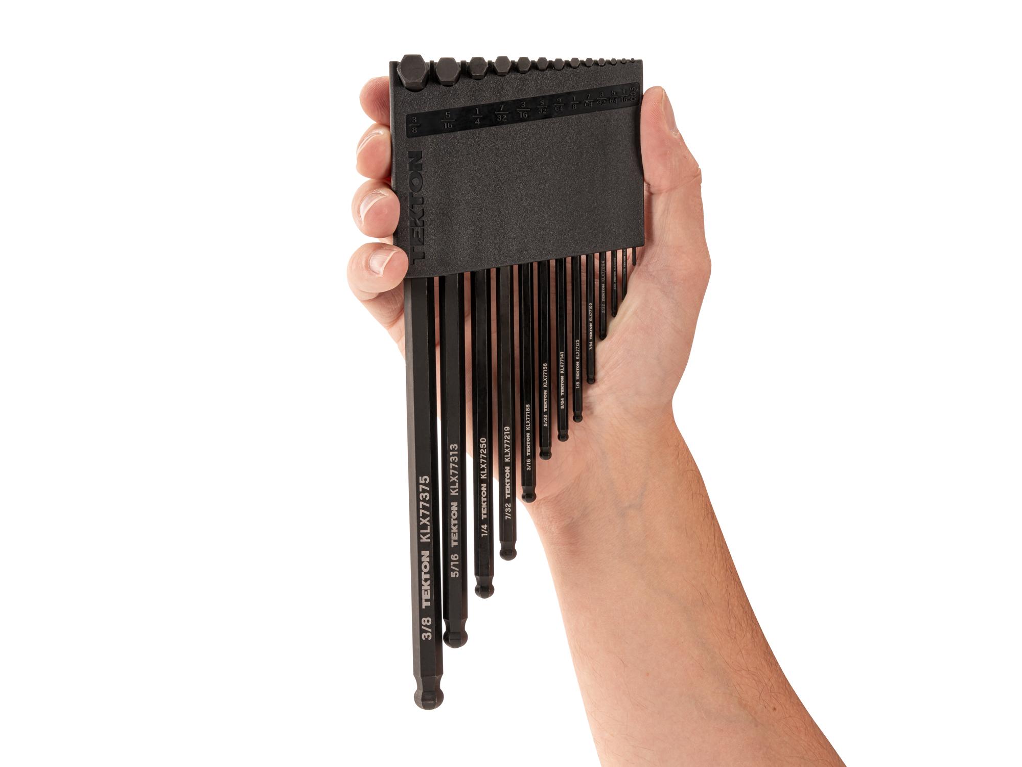 Person holding Tekton holder l-key set. Item #KLX91112