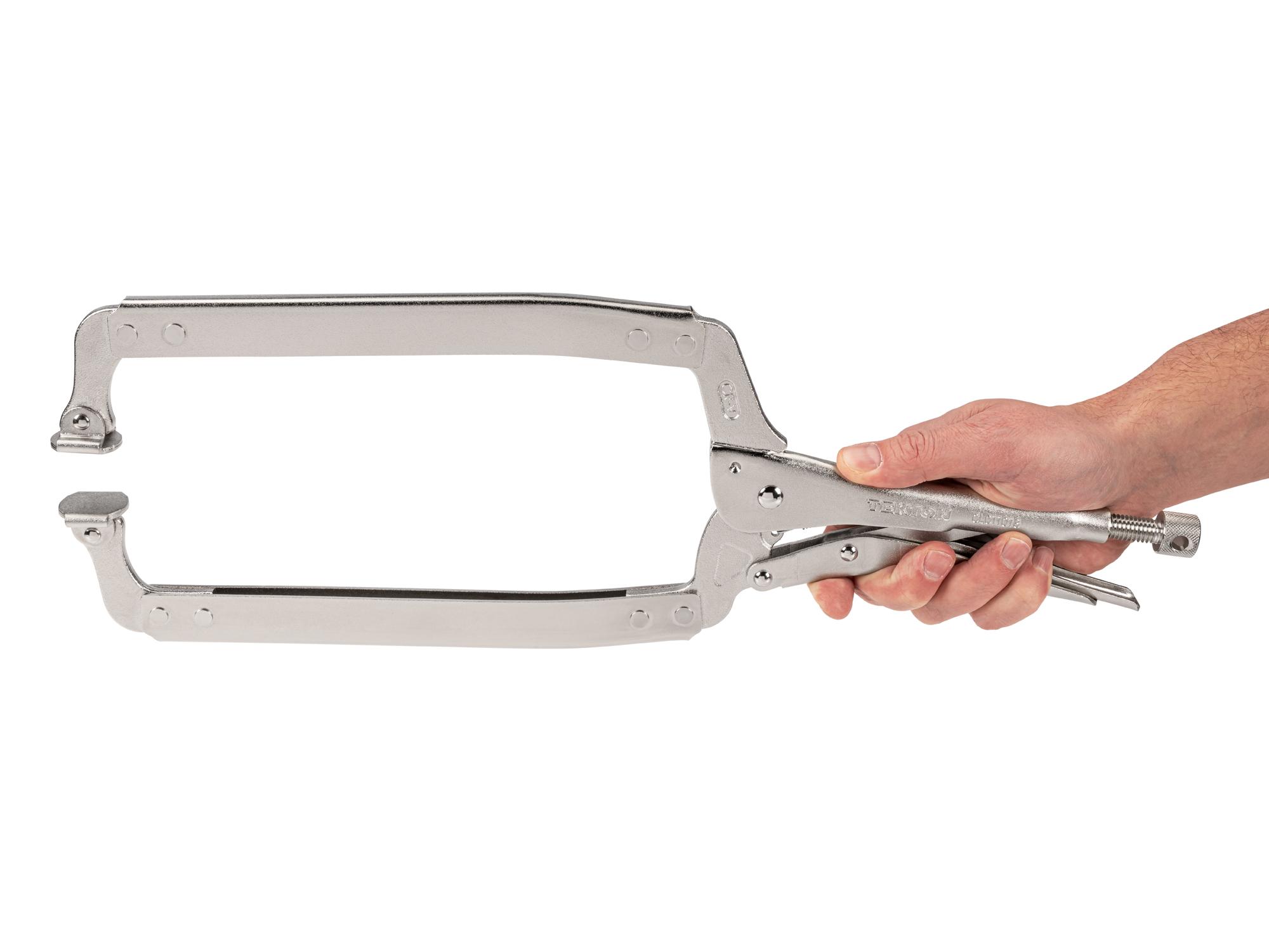 Person holding Tekton 18 inch locking clamp. Item #CLC11018