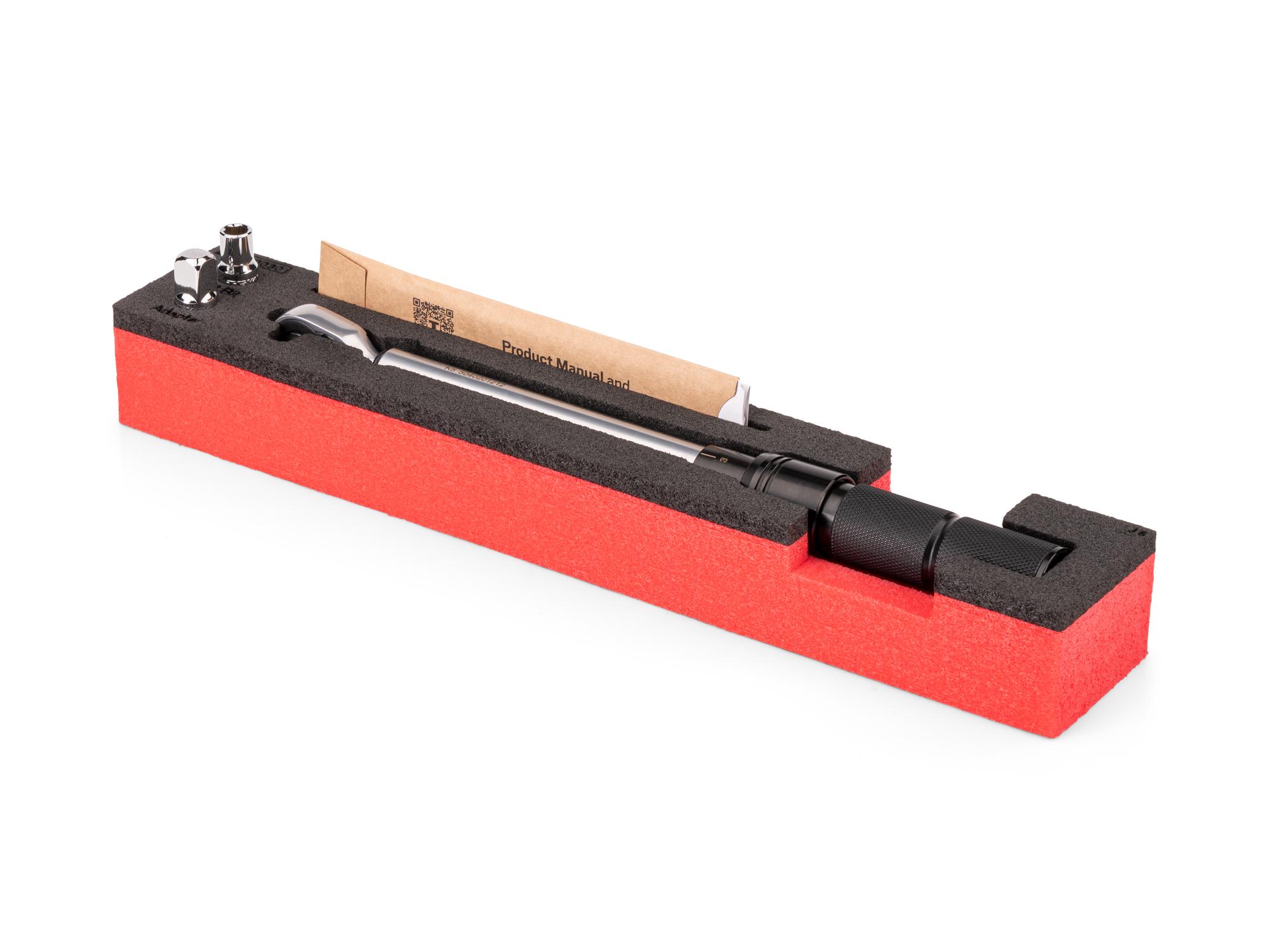 Angled view of red Tekton 1/4 inch drive, micrometer torque wrench with foam organizer. TRQ95001