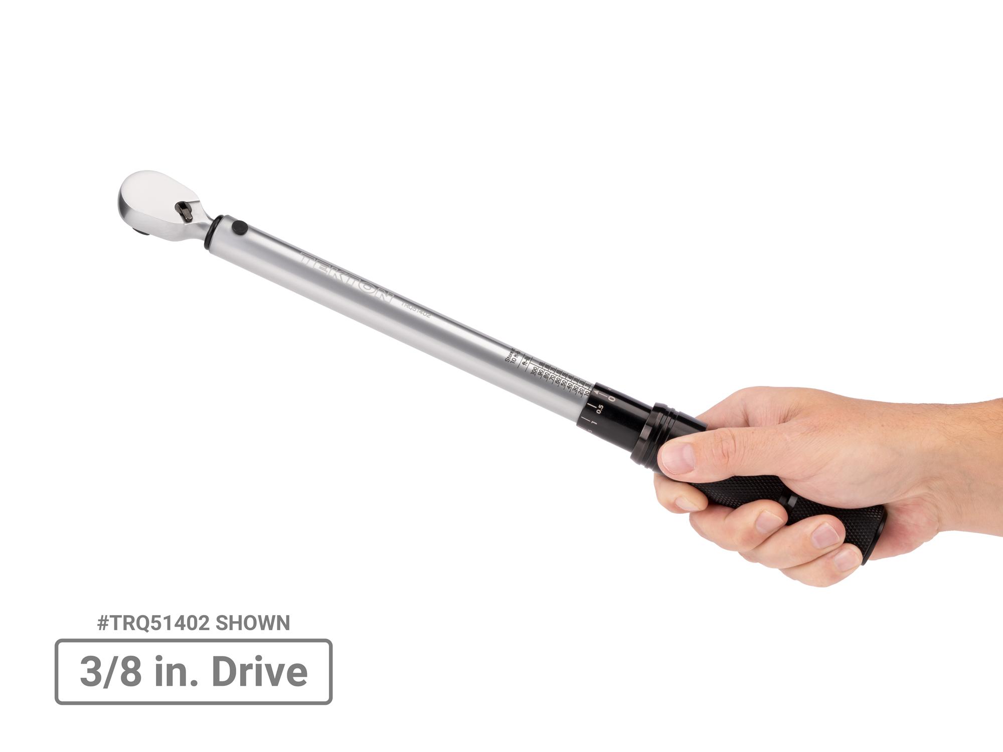 Person holding Tekton case micrometer torque wrench set. Item #TRQ95904