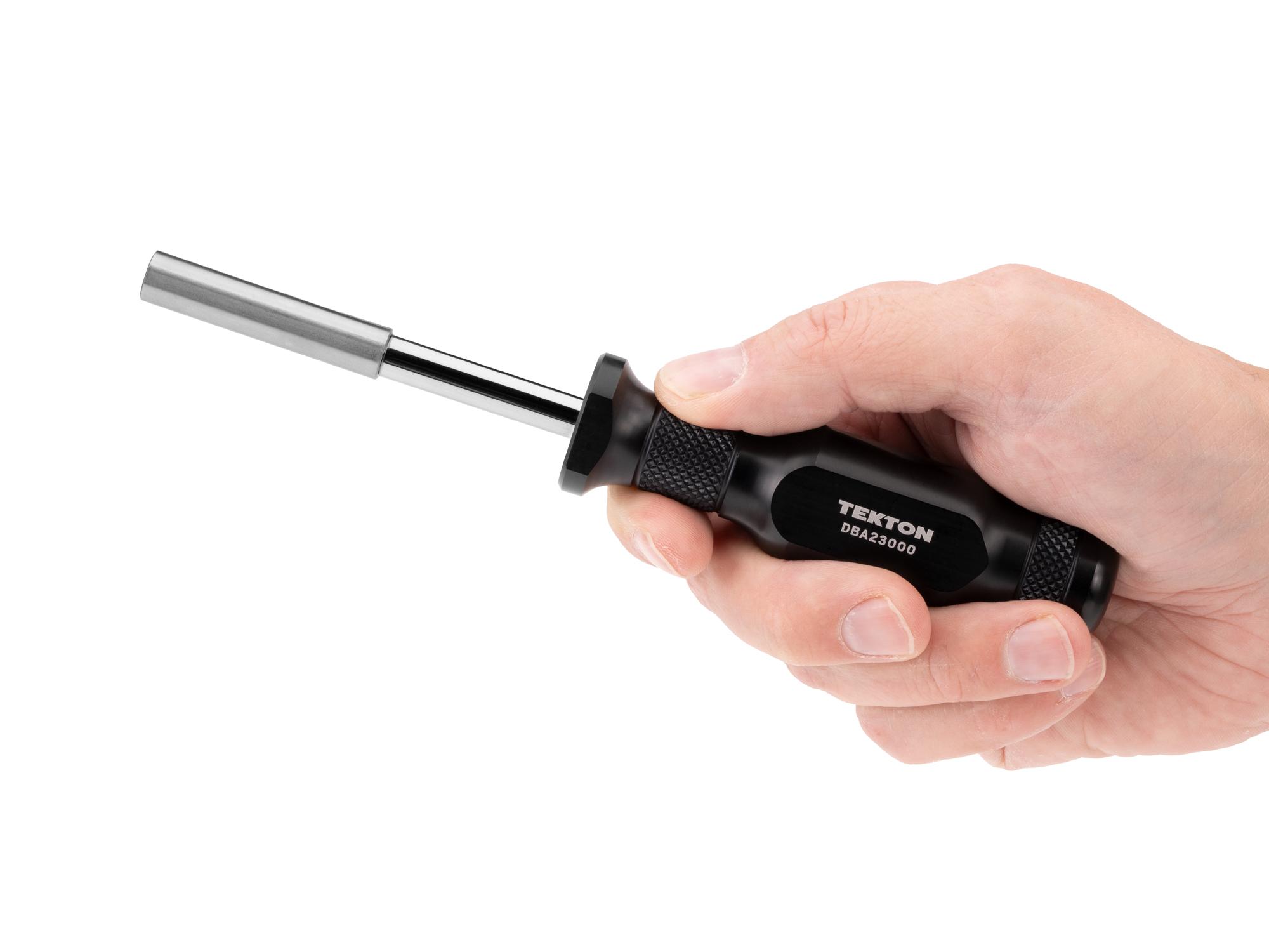Person holding Tekton multi-bit driver. Item #DBA23000