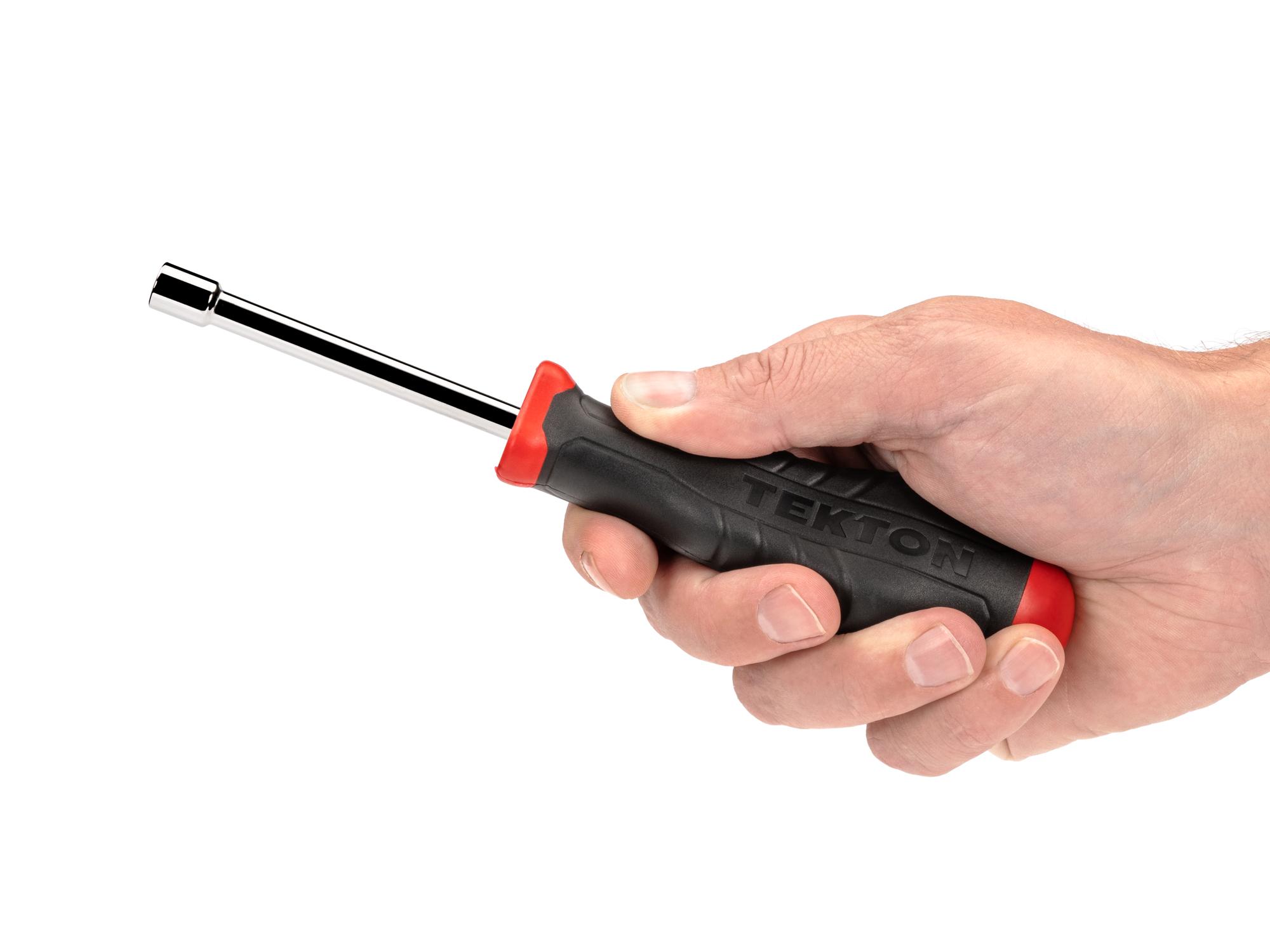 Person holding Tekton multi-bit driver. Item #DBH23000