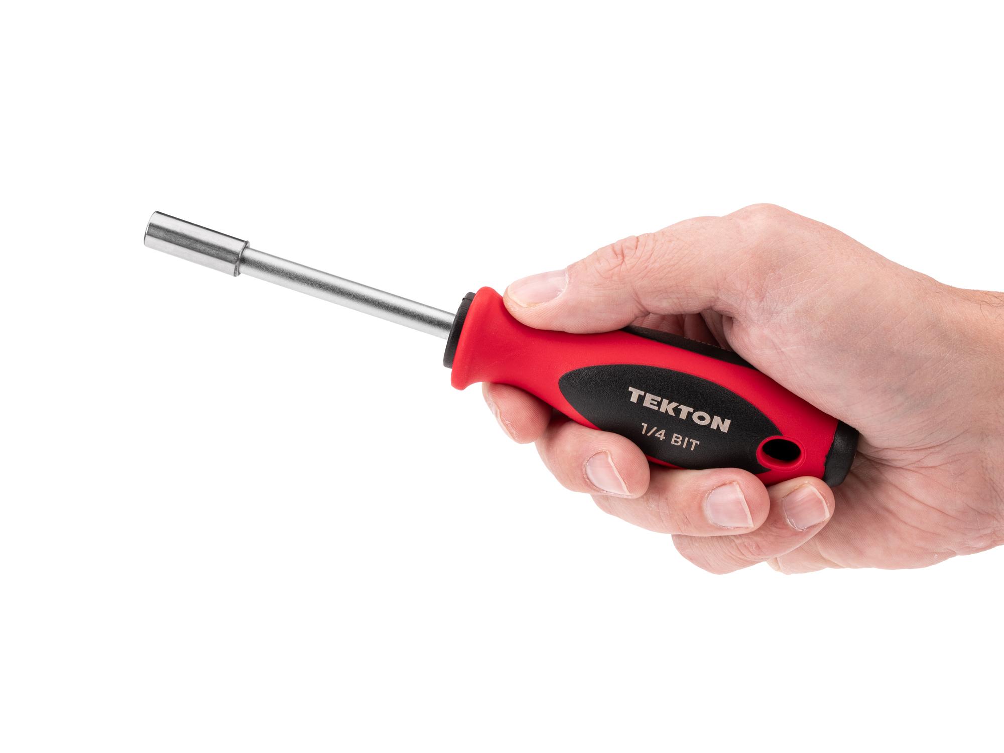 Person holding Tekton multi-bit driver. Item #DBW23000