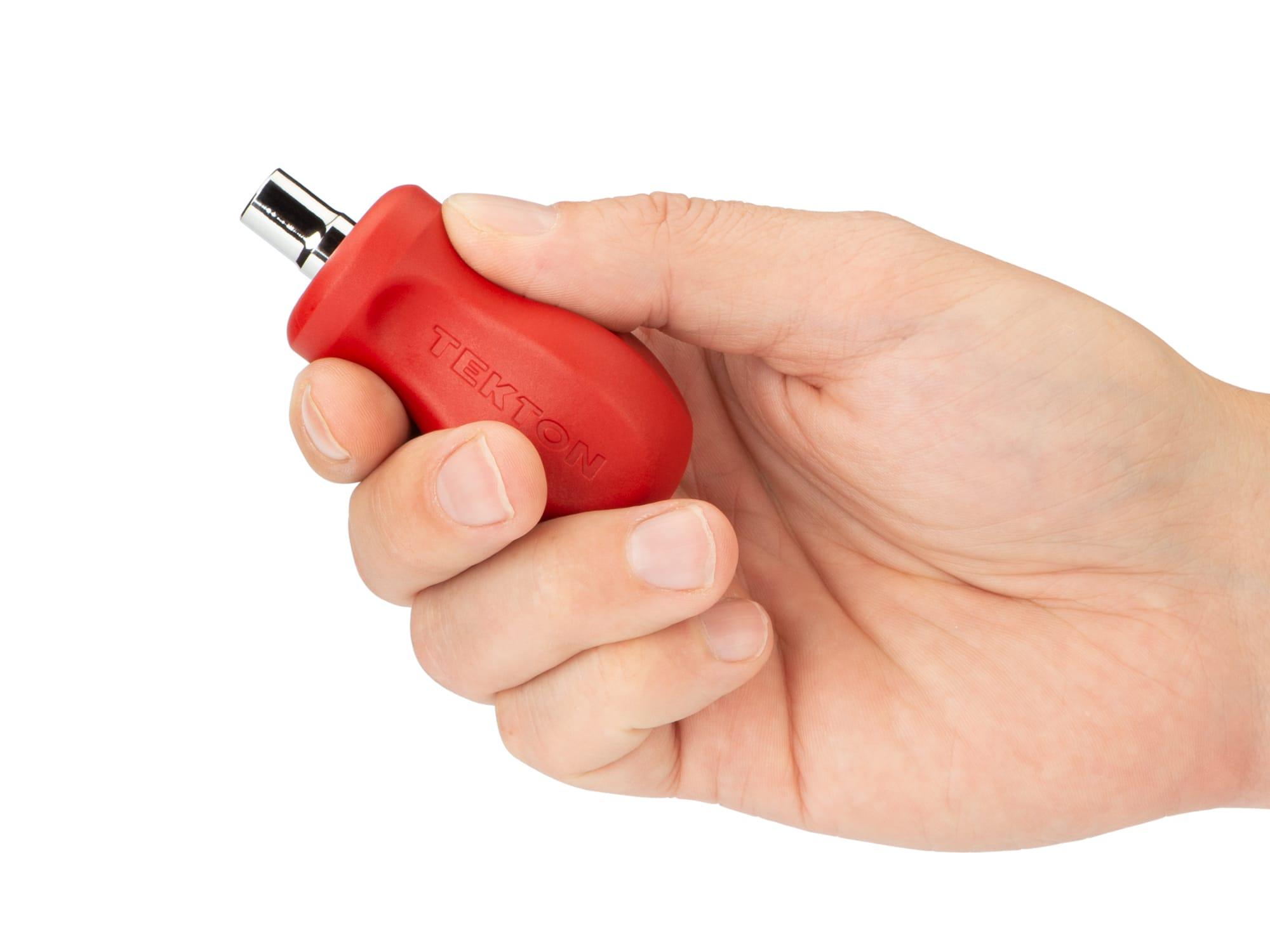 Person holding red Tekton multi-bit driver. Item #DMT17000