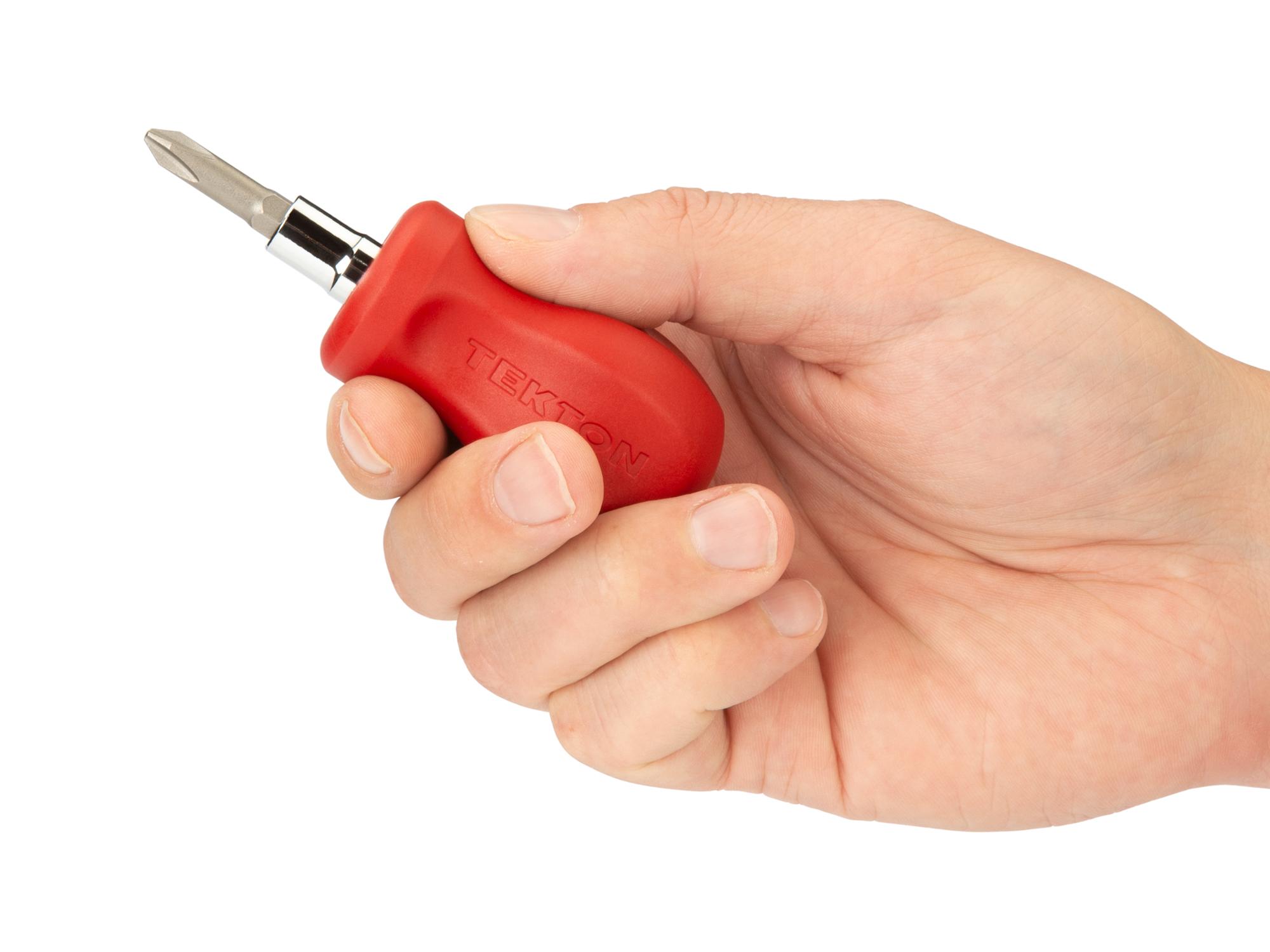 Person holding red Tekton multi-bit driver. Item #DMT17002