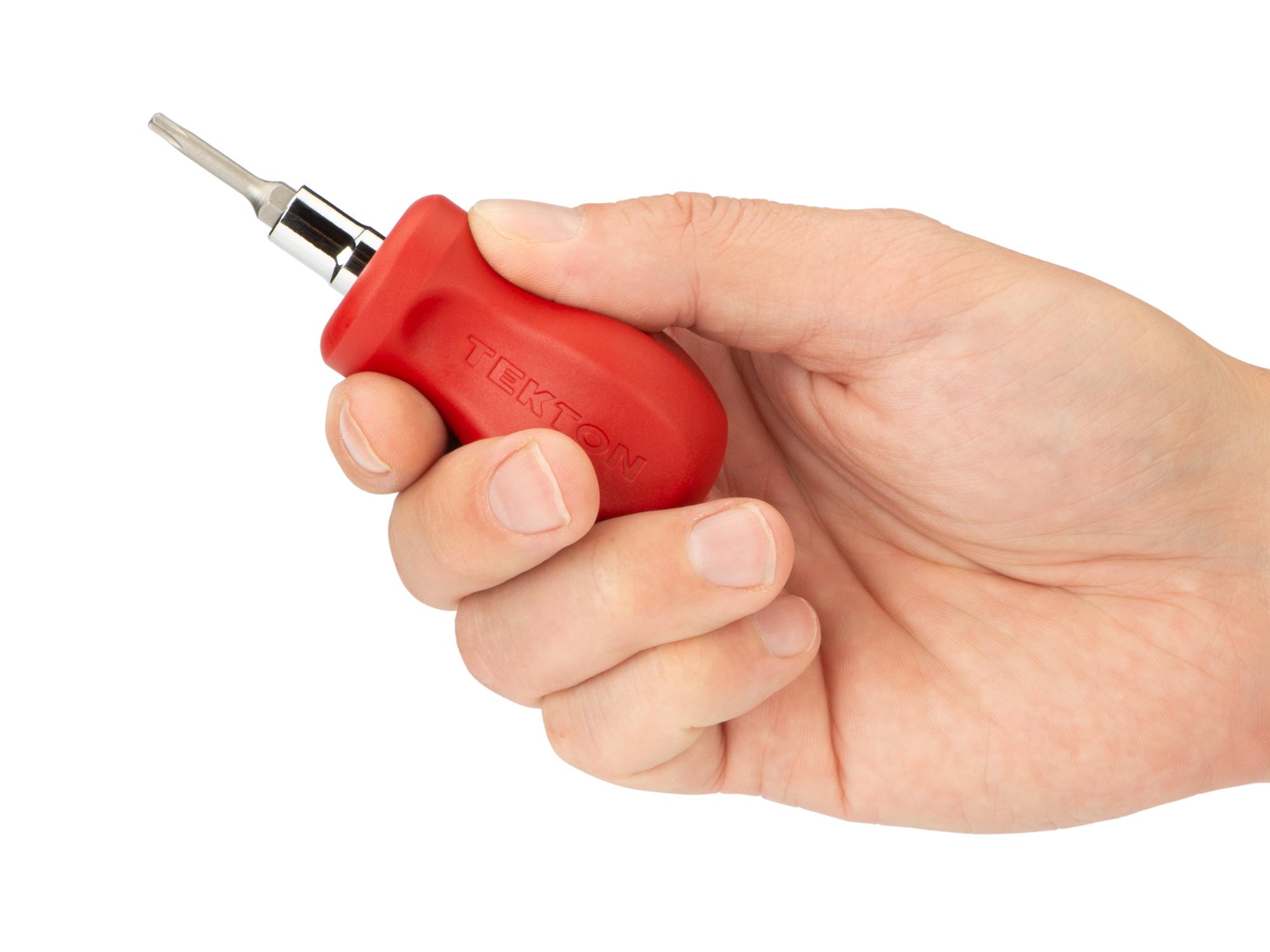 Person holding red Tekton multi-bit driver. Item #DMT17003