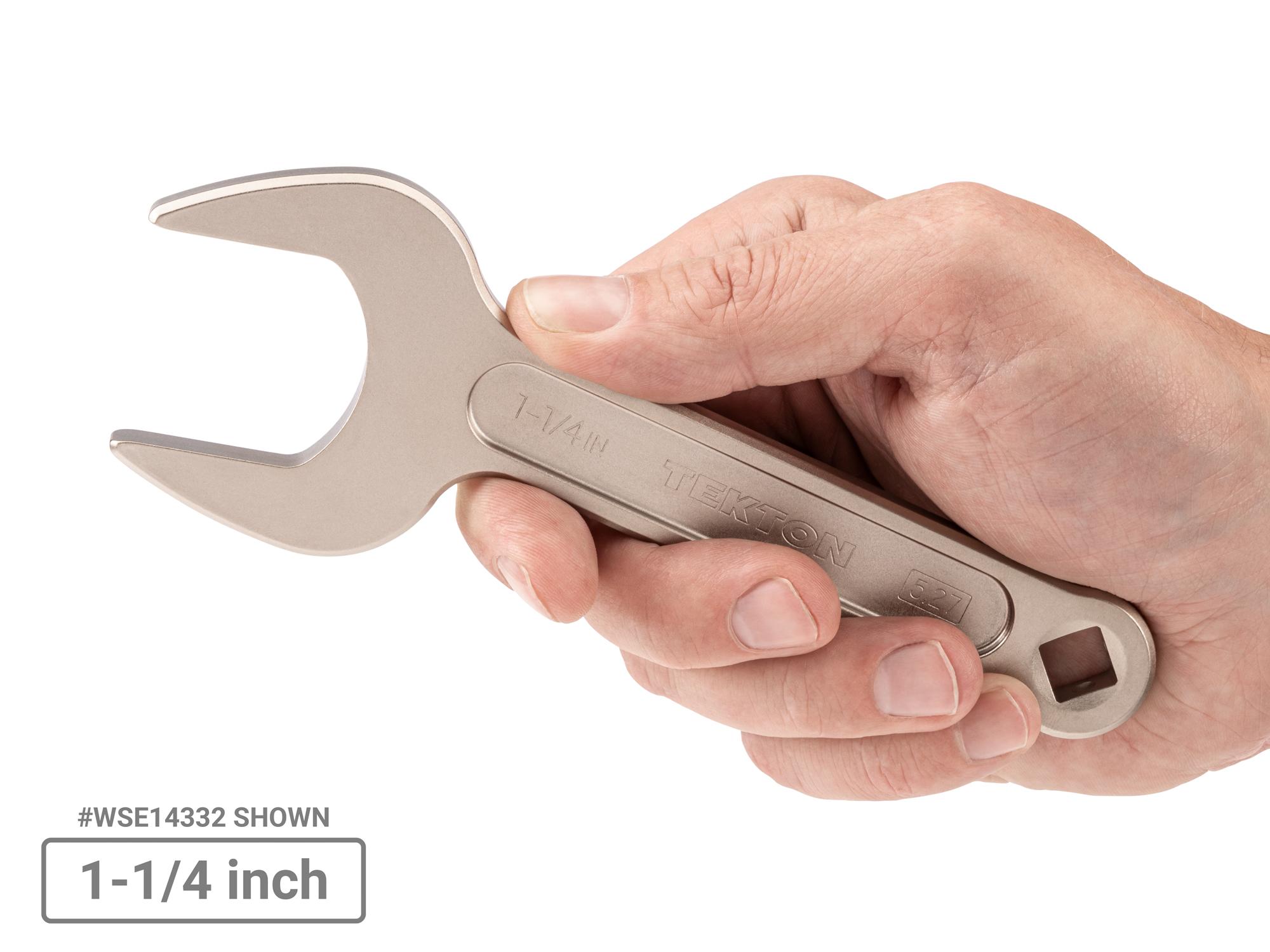 Person holding Tekton service wrench set. Item #WSE90100