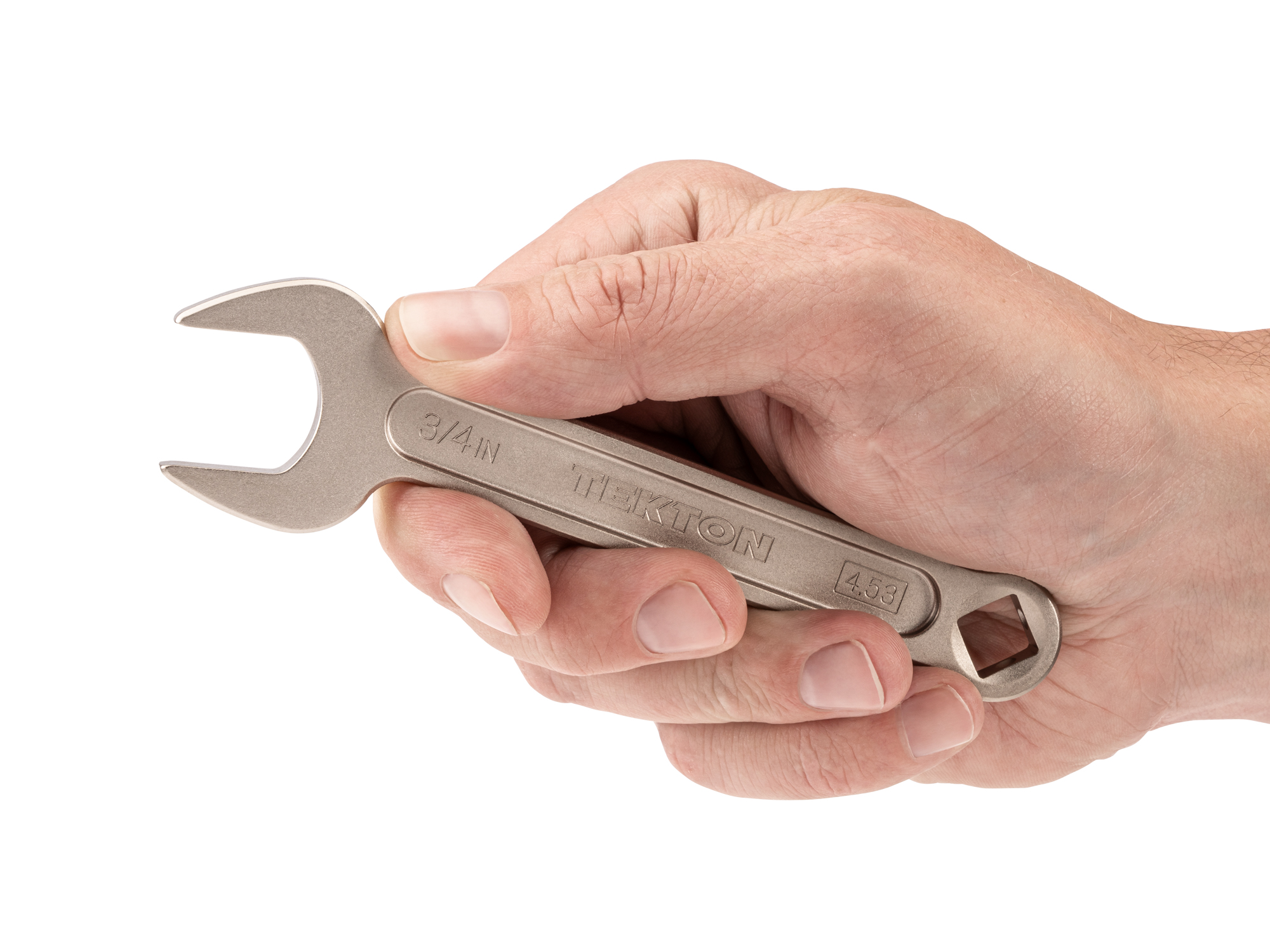 Person holding Tekton 3/4 inch open end wrench set. Item #WSE14319