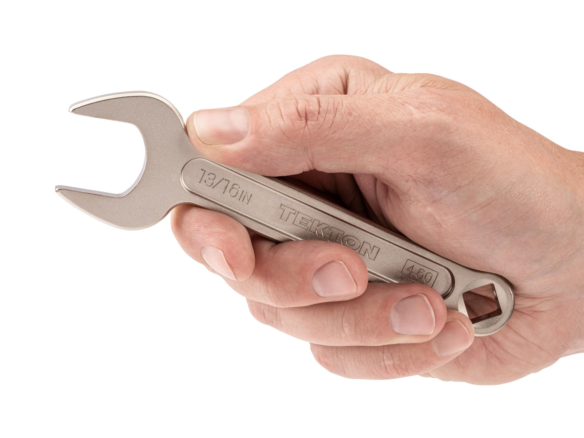 Person holding Tekton service wrench. Item #WSE14321