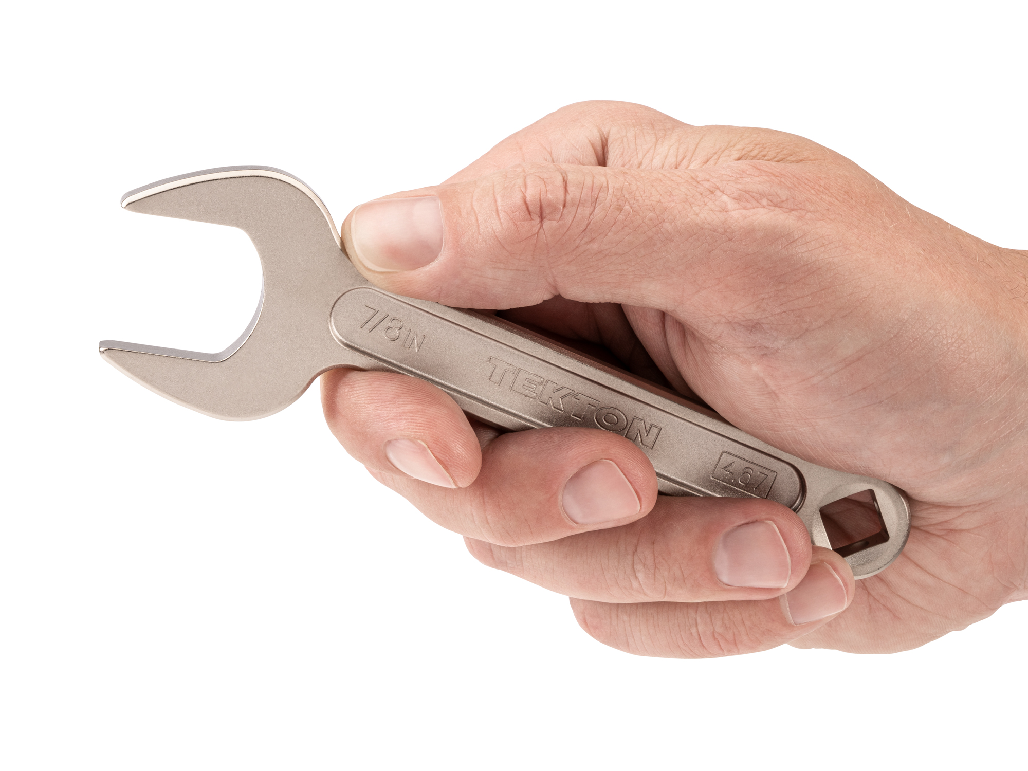 Person holding Tekton 7/8 inch open end wrench set. Item #WSE14322