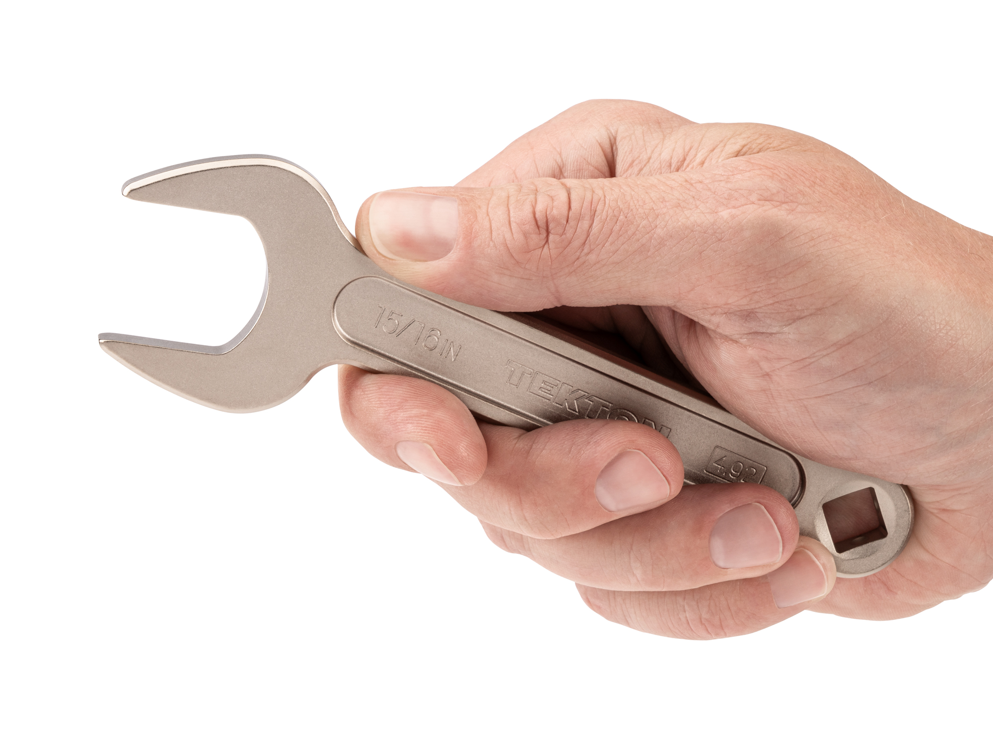 Person holding Tekton 15/16 inch open end wrench set. Item #WSE14324