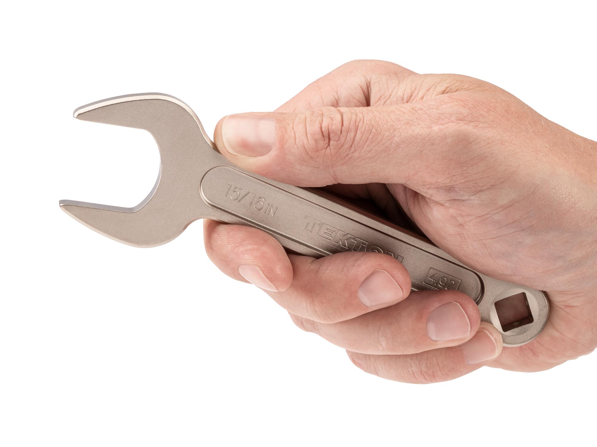 Person holding Tekton service wrench. Item #WSE14324