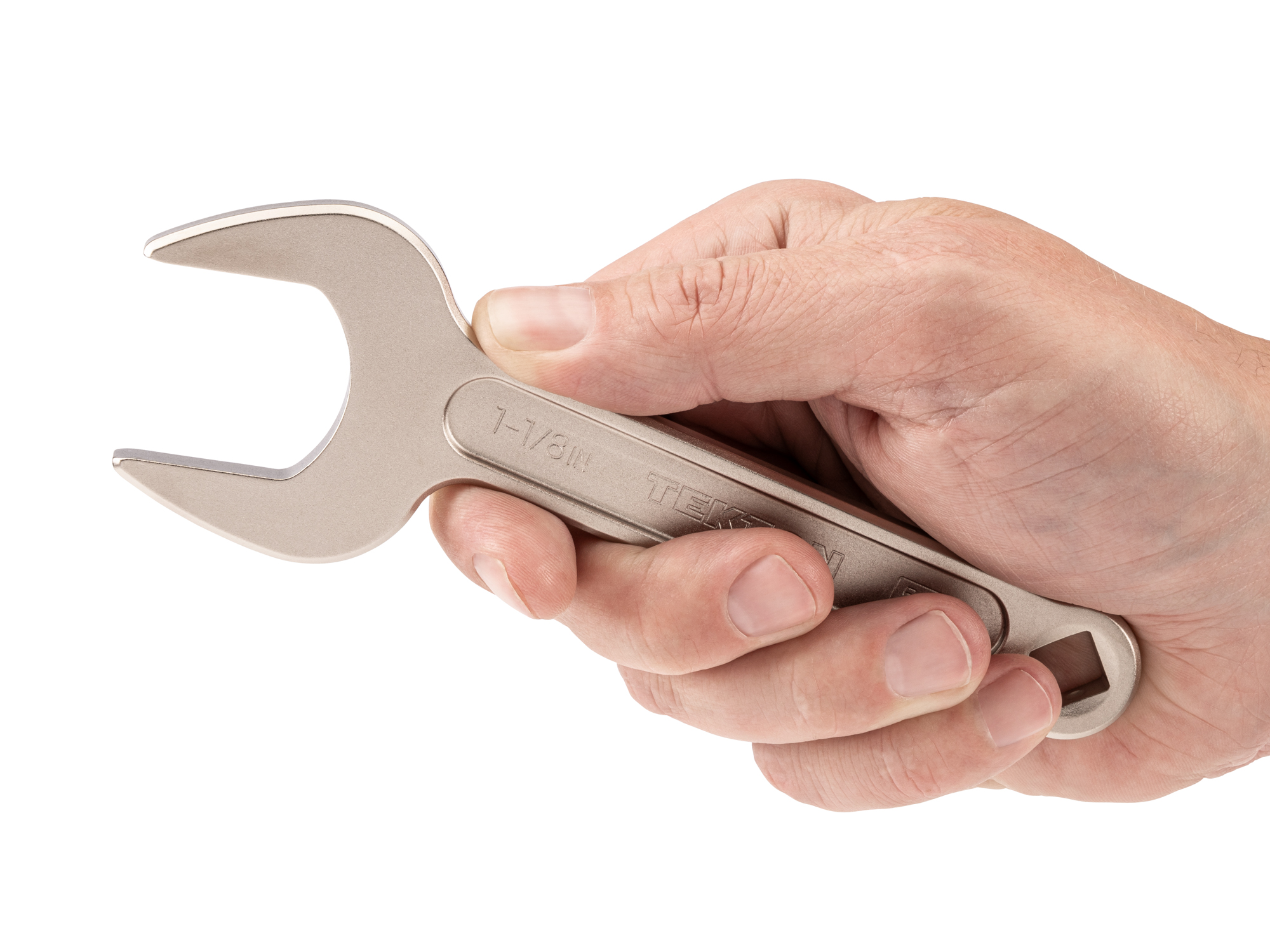 Person holding Tekton 1 1/8 inch open end wrench set. Item #WSE14329