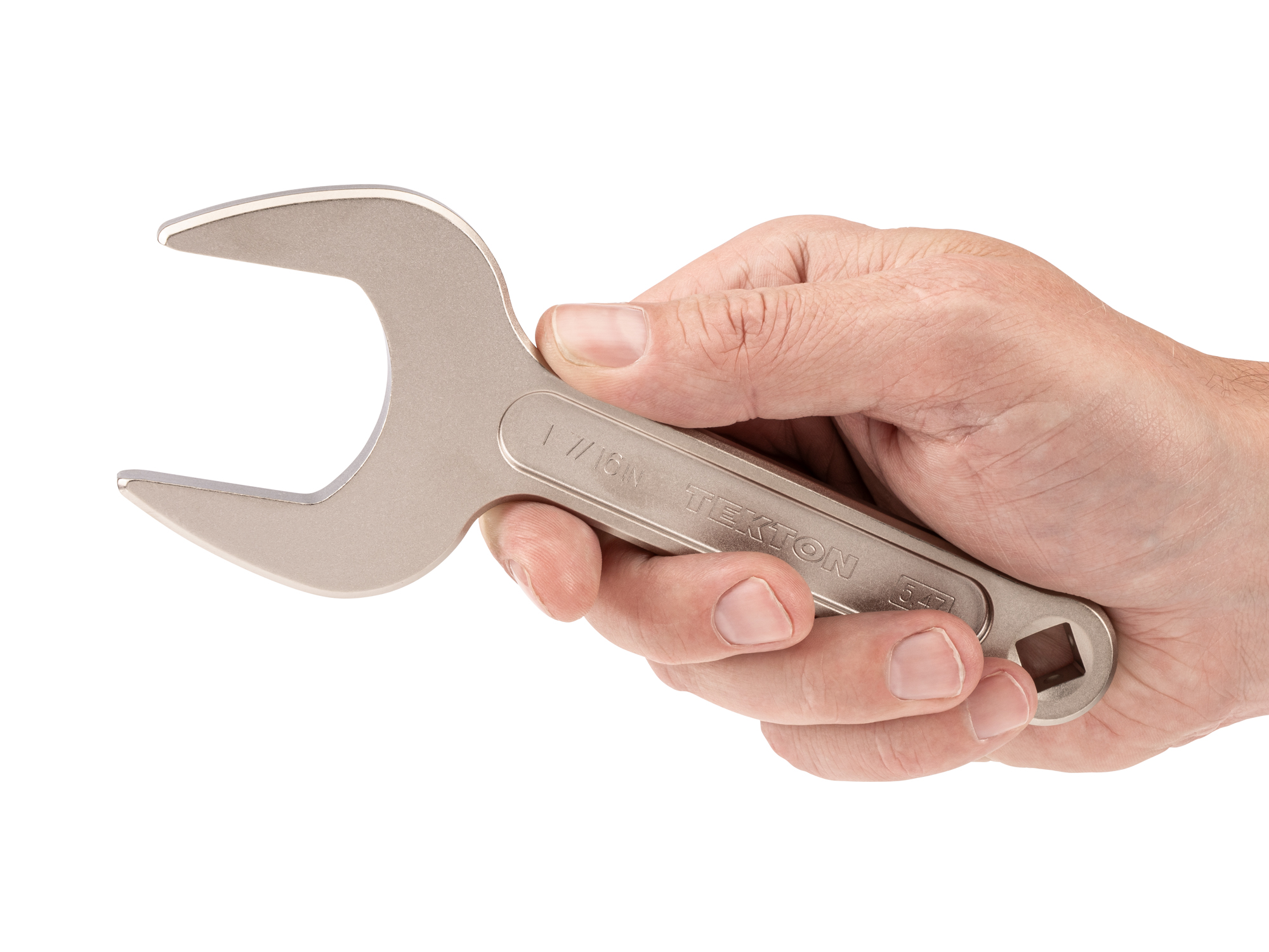 Person holding Tekton 1 7/16 inch open end wrench set. Item #WSE14336