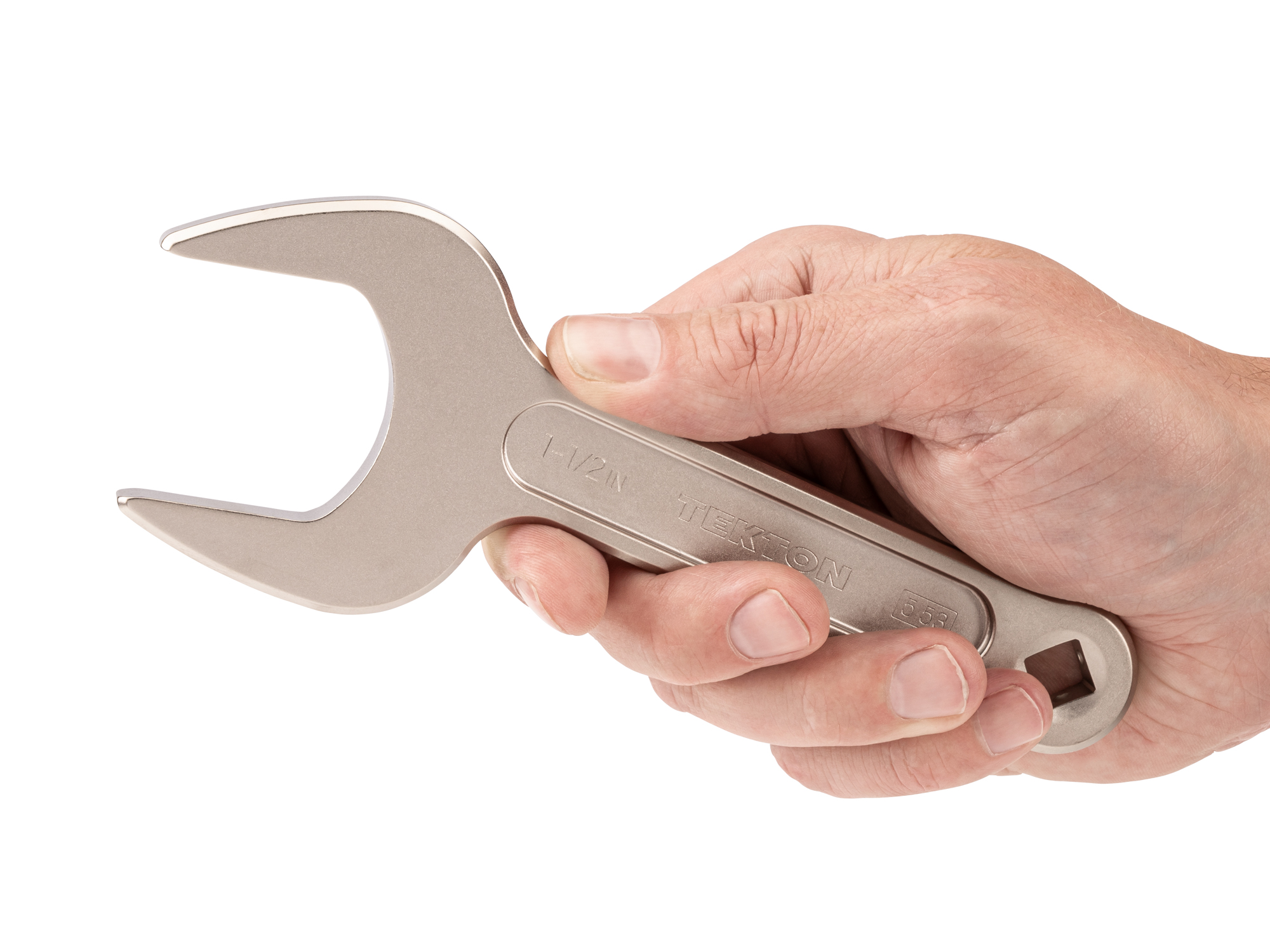Person holding Tekton 1 1/2 inch open end wrench set. Item #WSE14338