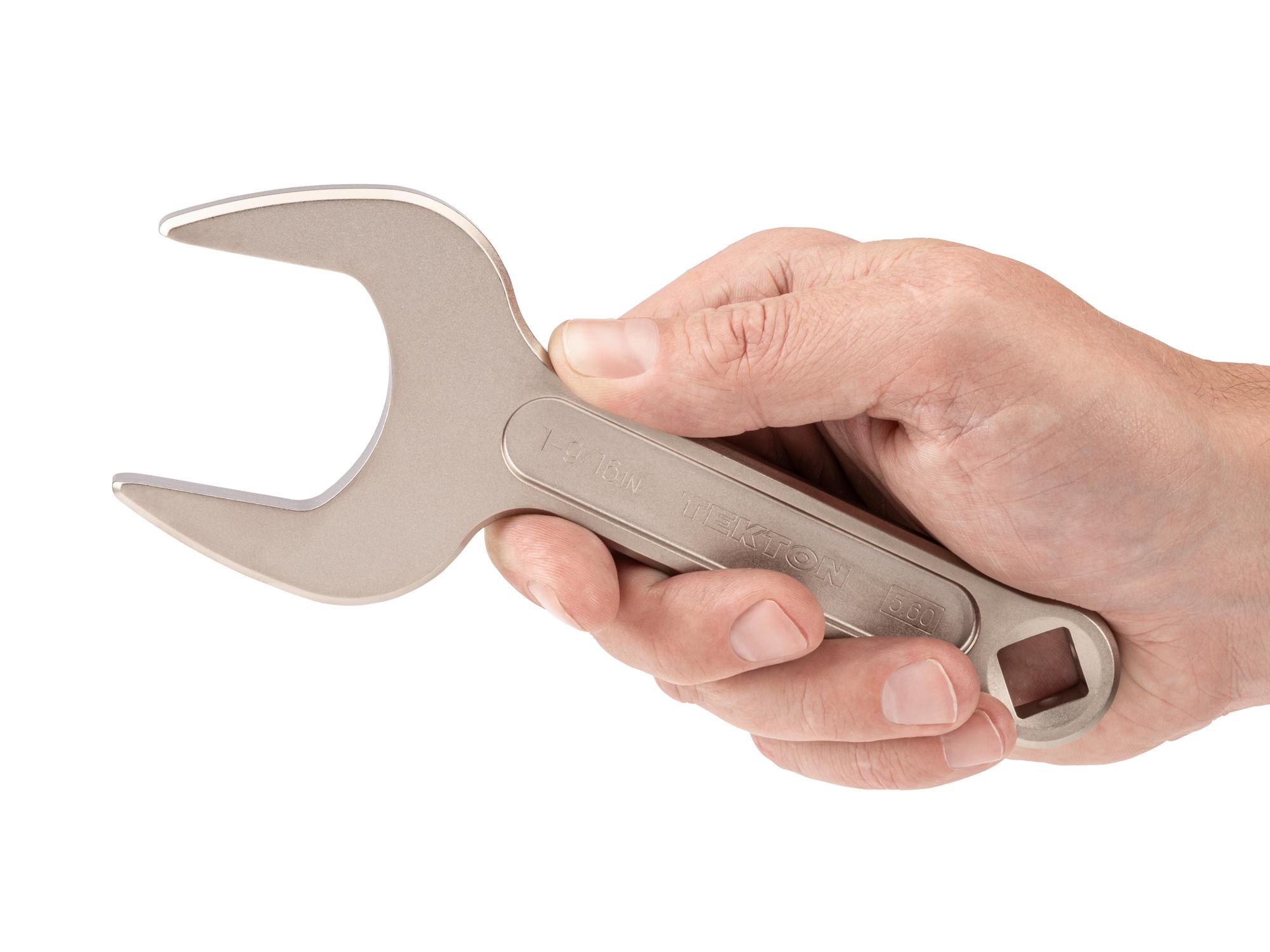 Person holding Tekton service wrench. Item #WSE14339