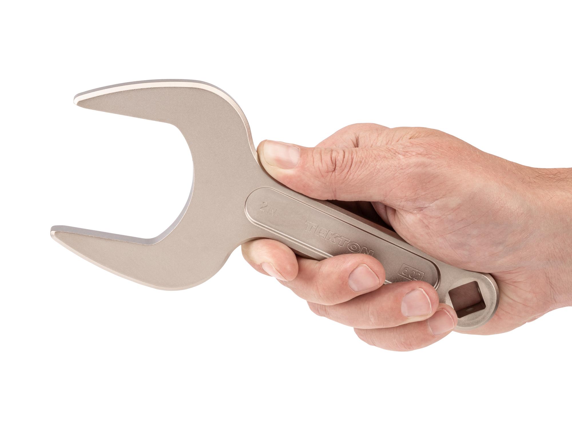 Person holding Tekton service wrench. Item #WSE14351