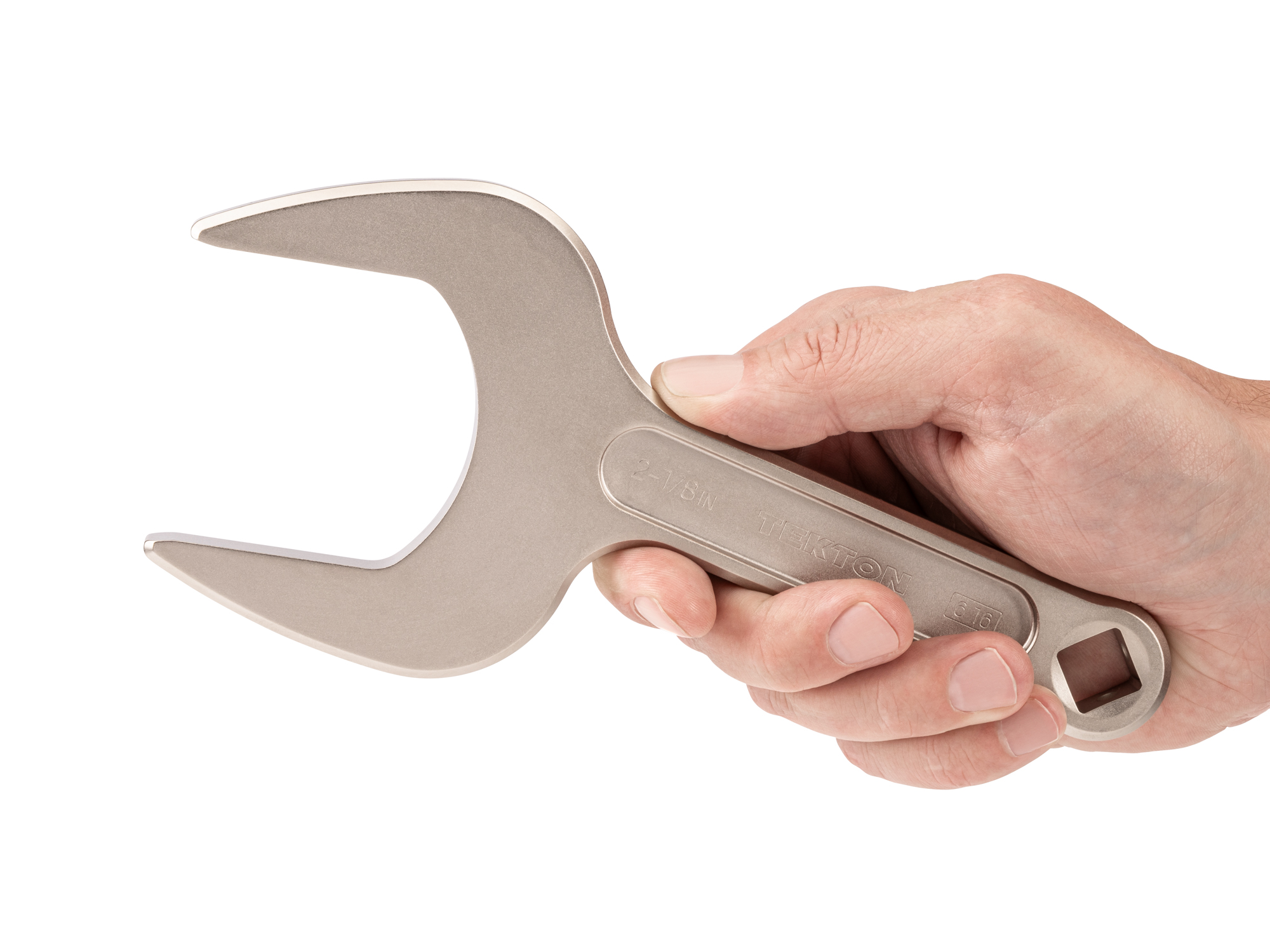 Person holding Tekton 2 1/8 inch open end wrench set. Item #WSE14354