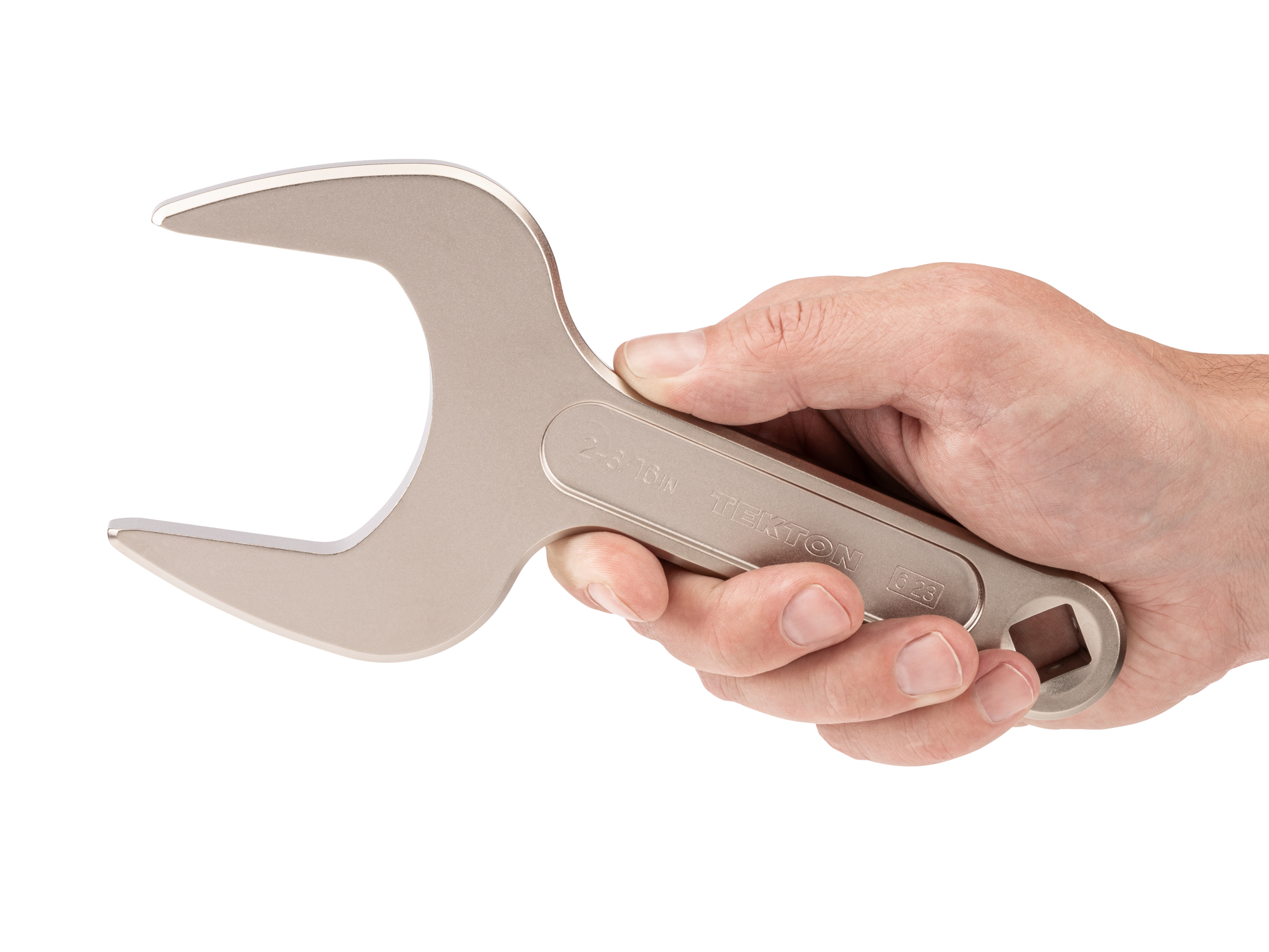 Person holding Tekton 2 3/16 inch open end wrench set. Item #WSE14355