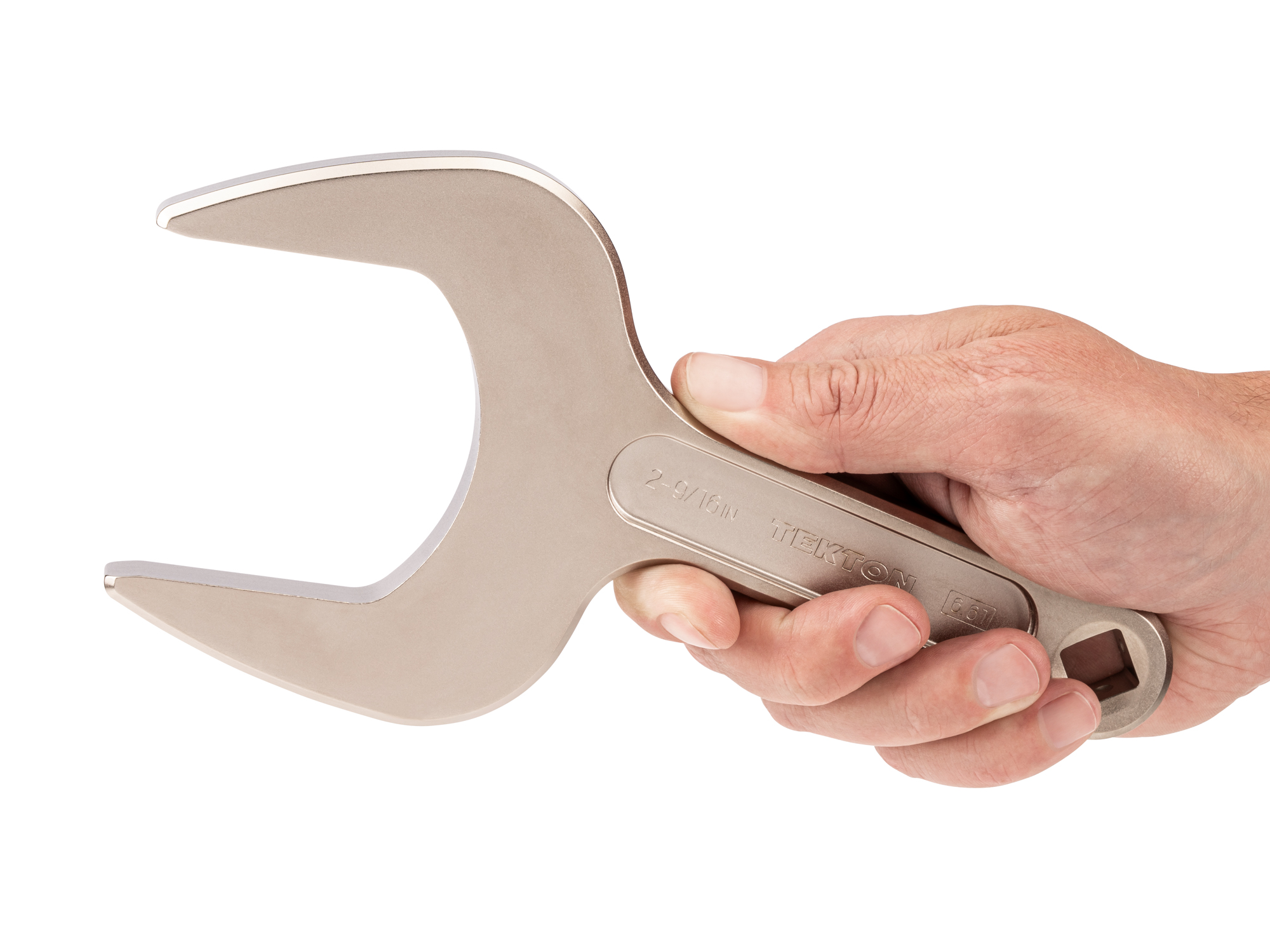 Person holding Tekton 2 9/16 inch open end wrench set. Item #WSE14365