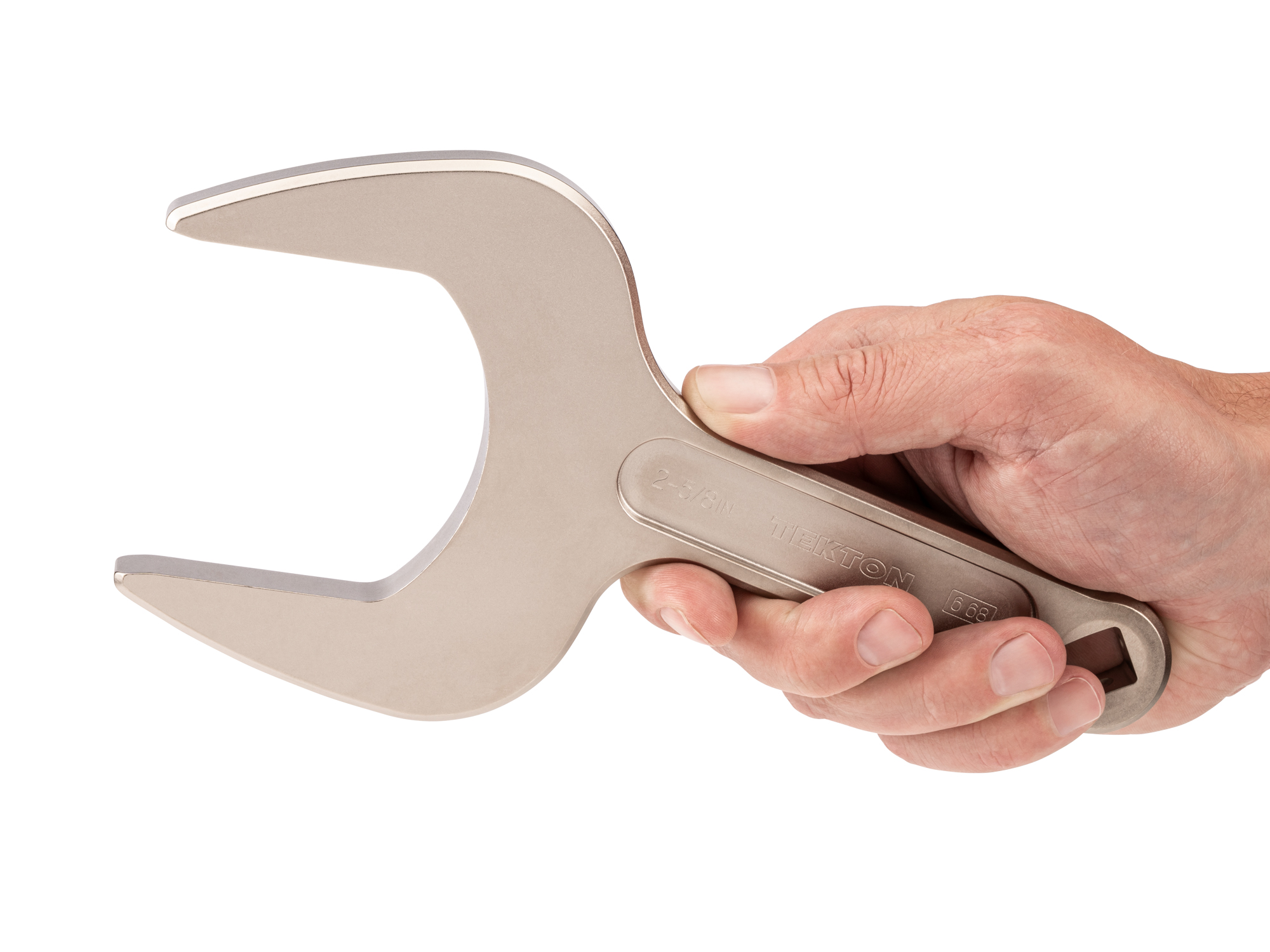 Person holding Tekton 2 5/8 inch open end wrench set. Item #WSE14367