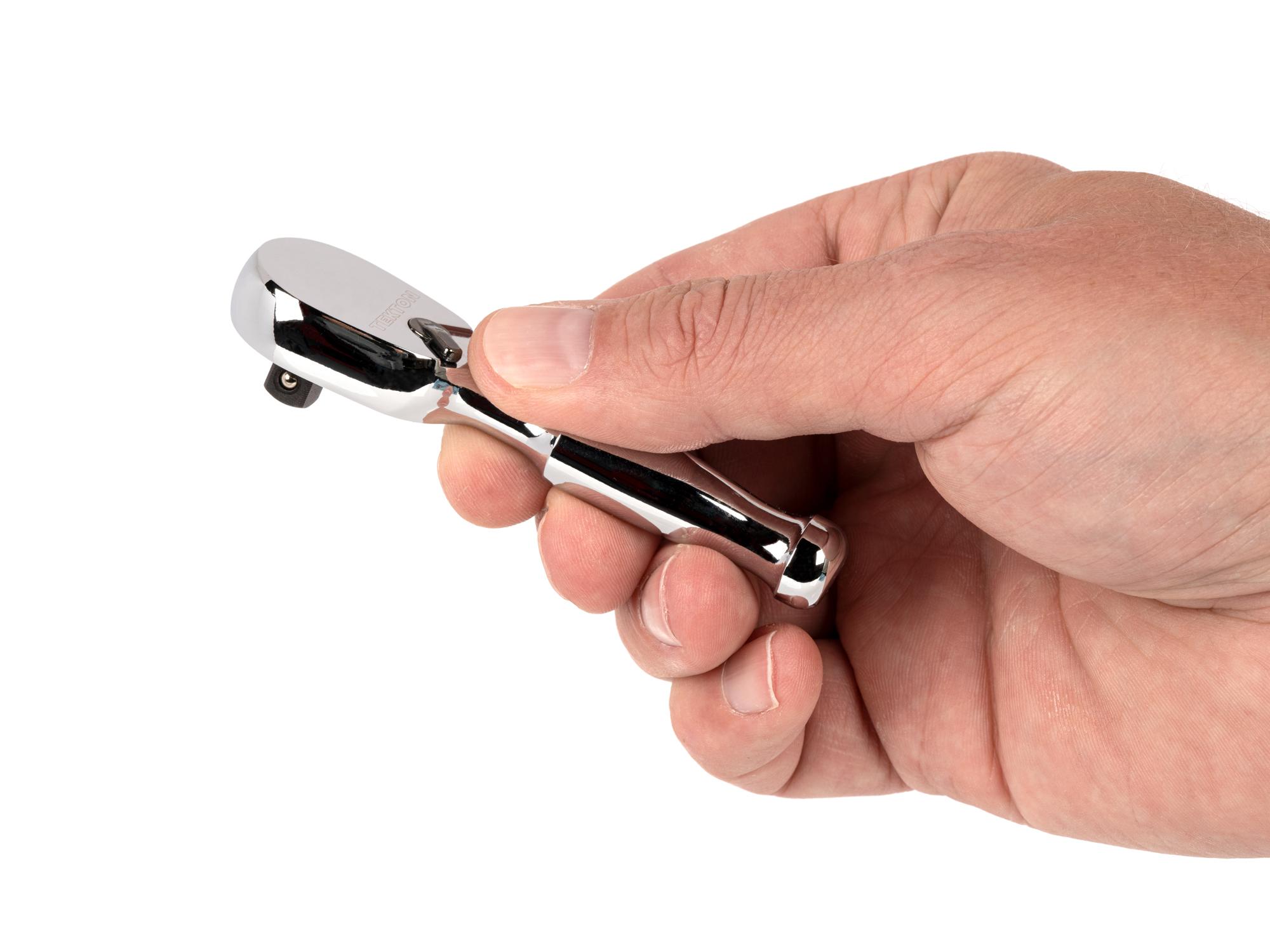 Person holding Tekton 3 inch ratchet. Item #SRH01003