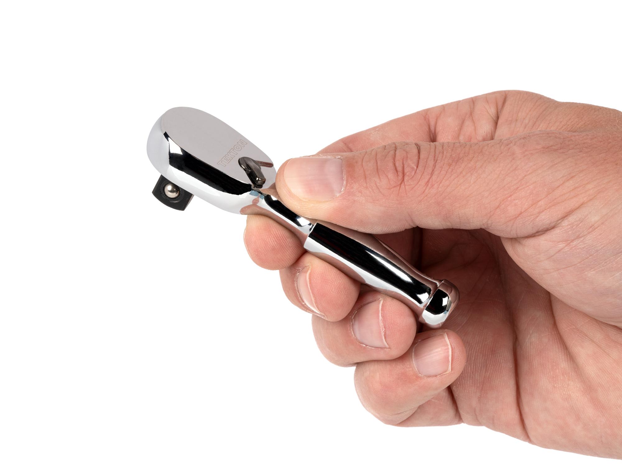 Person holding Tekton 3 inch ratchet. Item #SRH01503