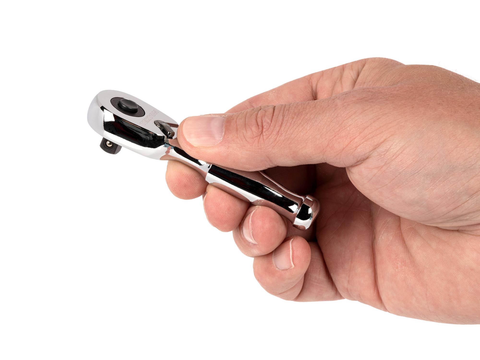 Person holding Tekton 3 inch ratchet. Item #SRH11003