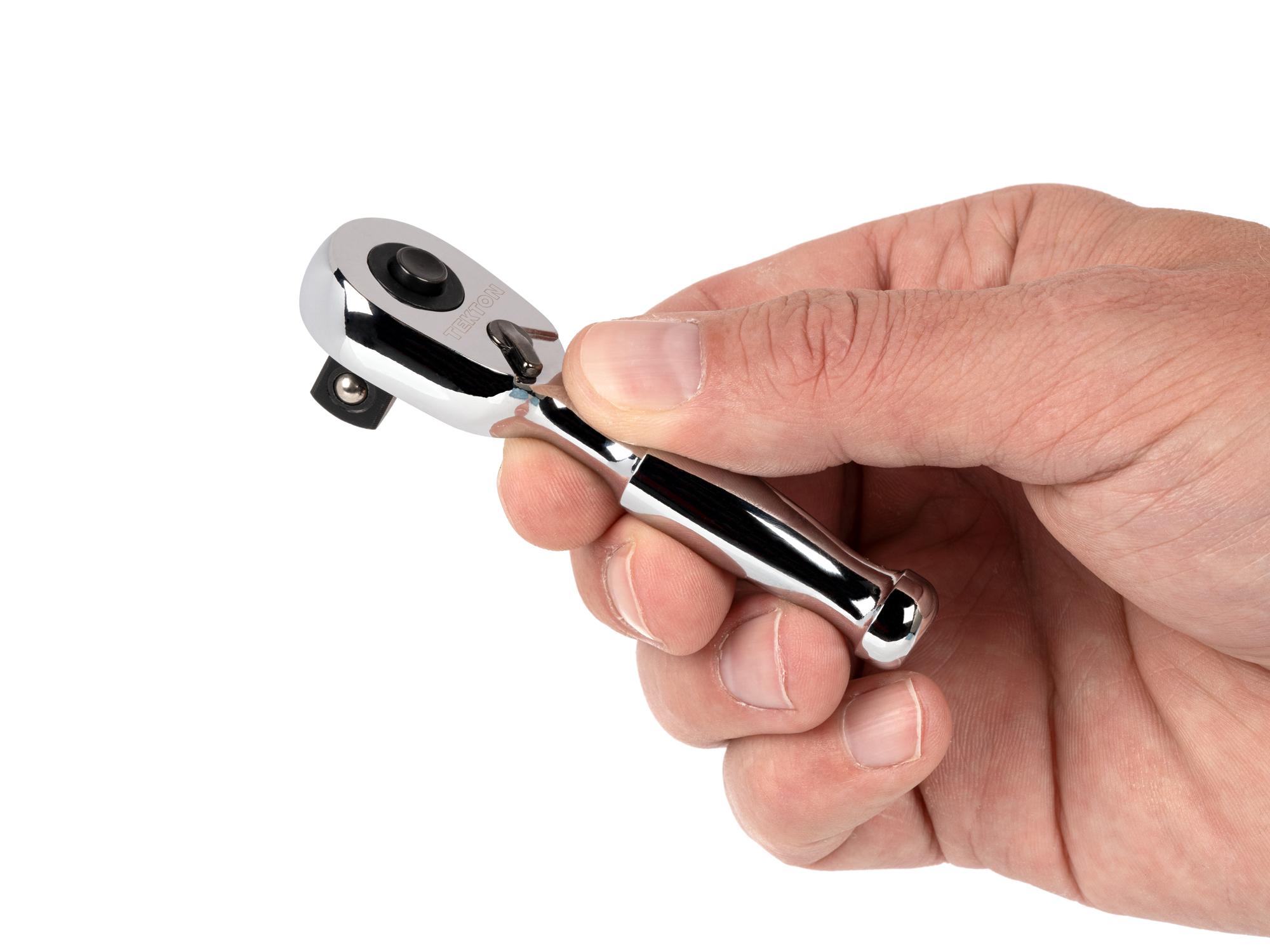 Person holding Tekton 3 inch ratchet. Item #SRH11503