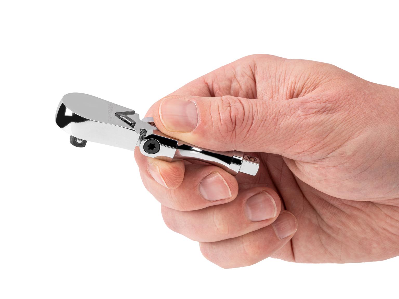 Person holding Tekton 3 inch ratchet. Item #SRH28003