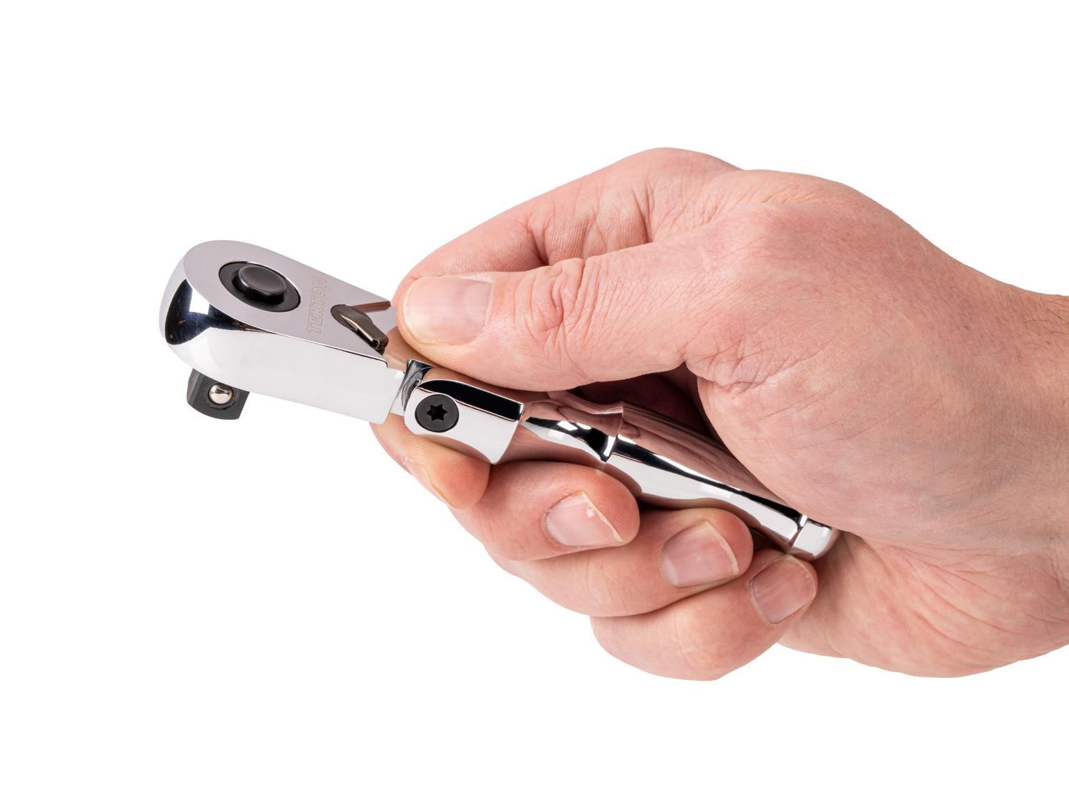 Person holding Tekton 4.5 inch ratchet. Item #SRH36104