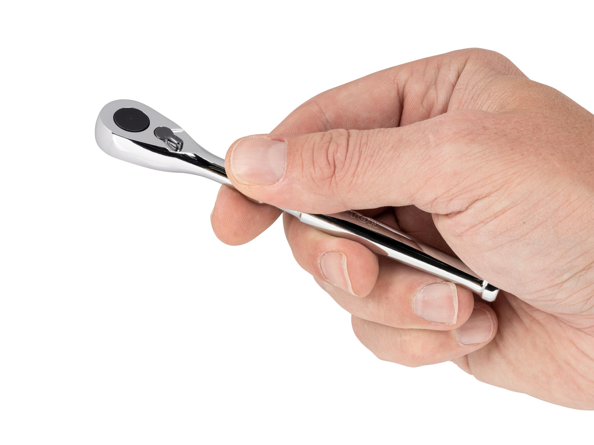 Person holding Tekton 4 1/2 inch ratchet. Item #SRH71004