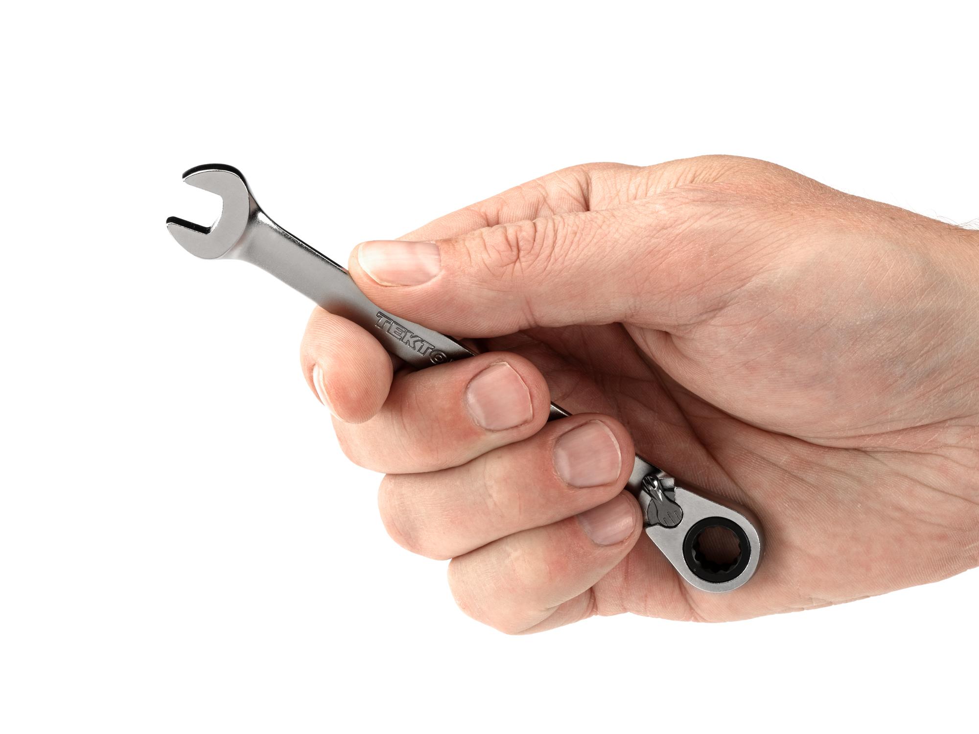 Person holding Tekton ratcheting combination wrench. Item #WRC23308