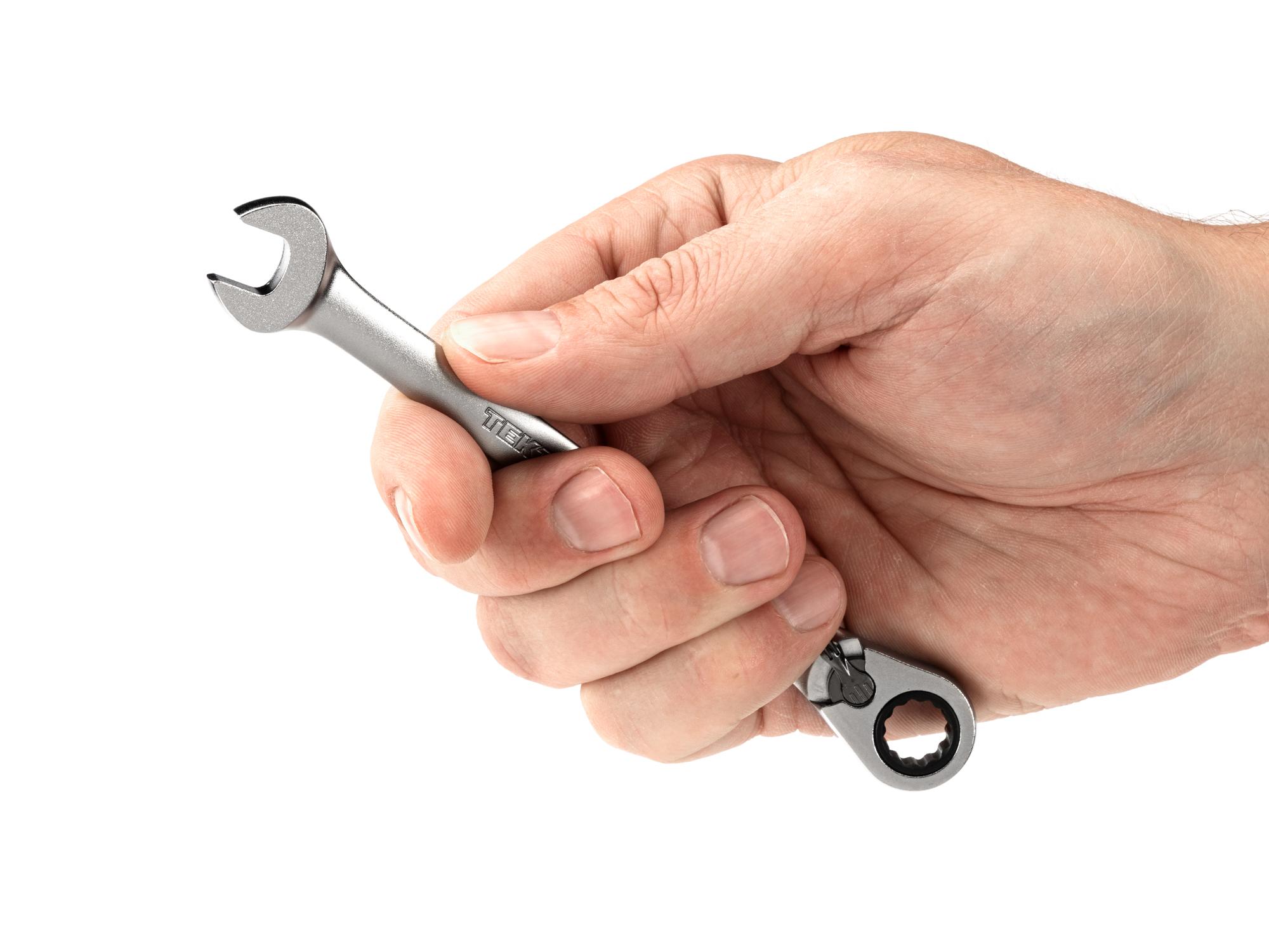 Person holding Tekton ratcheting combination wrench. Item #WRC23309