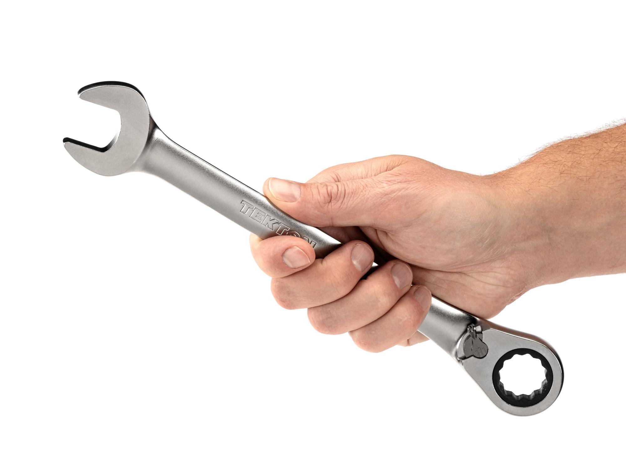 Person holding Tekton ratcheting combination wrench. Item #WRC23321