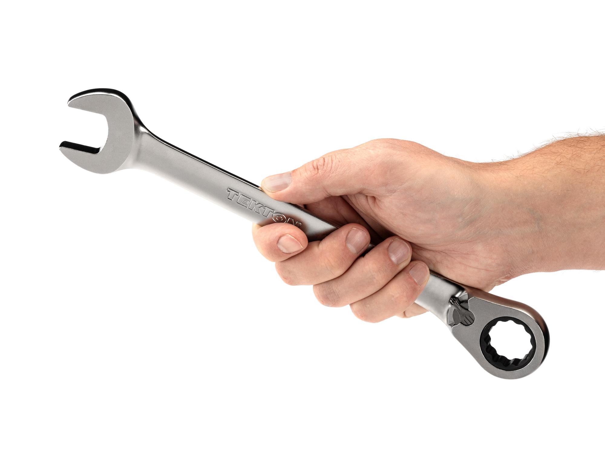 Person holding Tekton ratcheting combination wrench. Item #WRC23322
