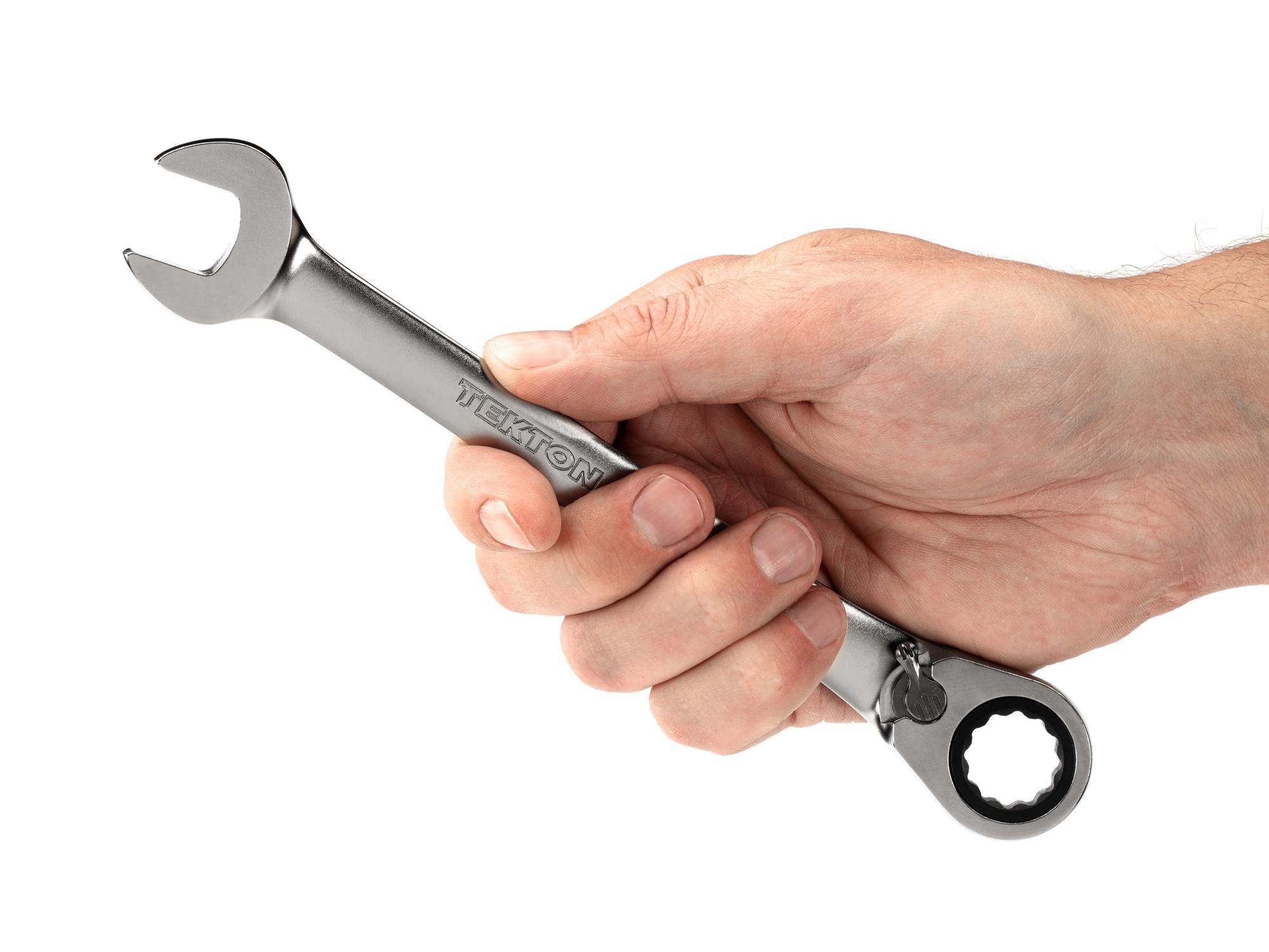 Person holding Tekton ratcheting combination wrench. Item #WRC23416